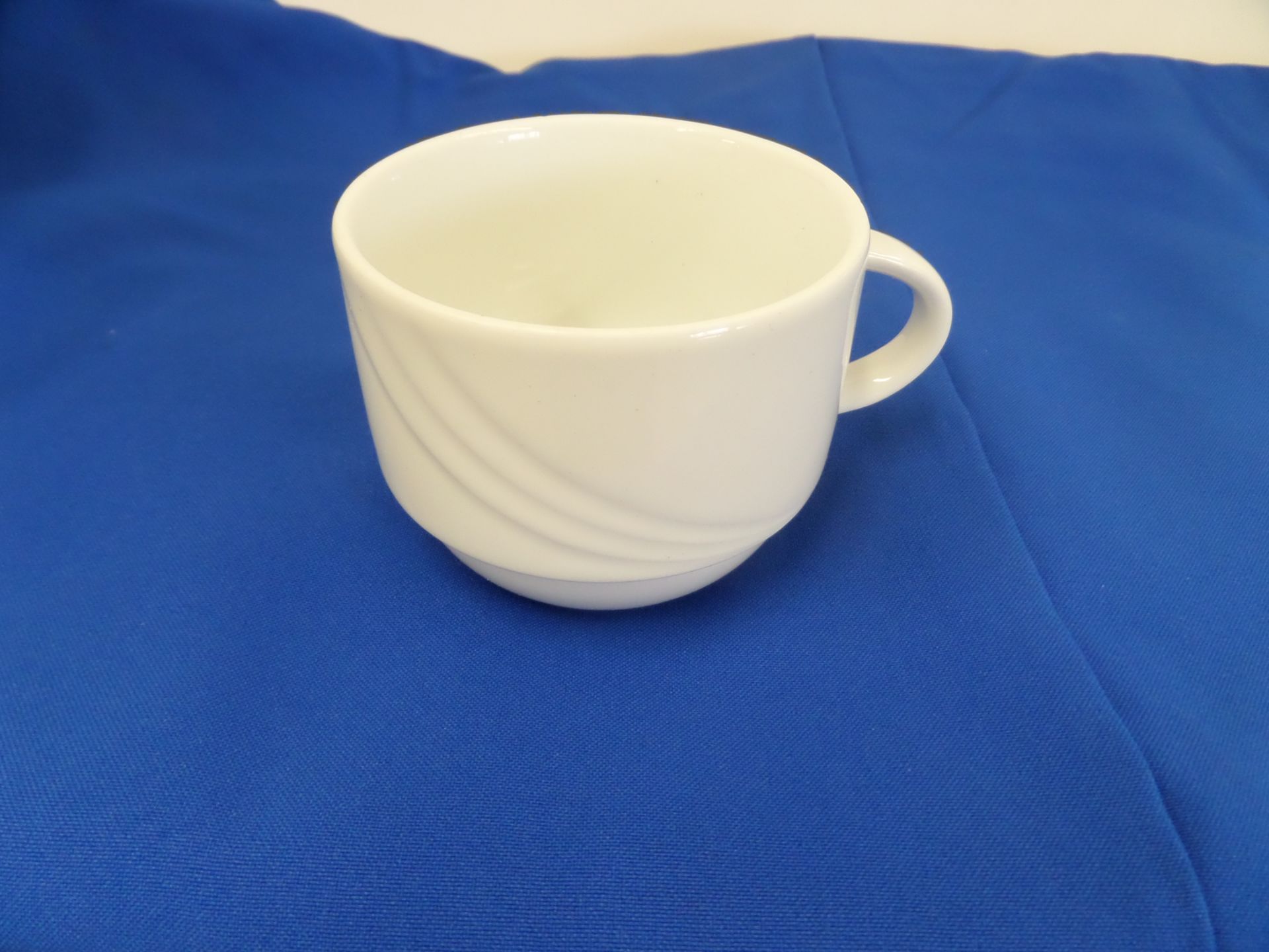 (136) Schonwald Ceramic White Coffee Cups in 8 Plastic Glass Racks