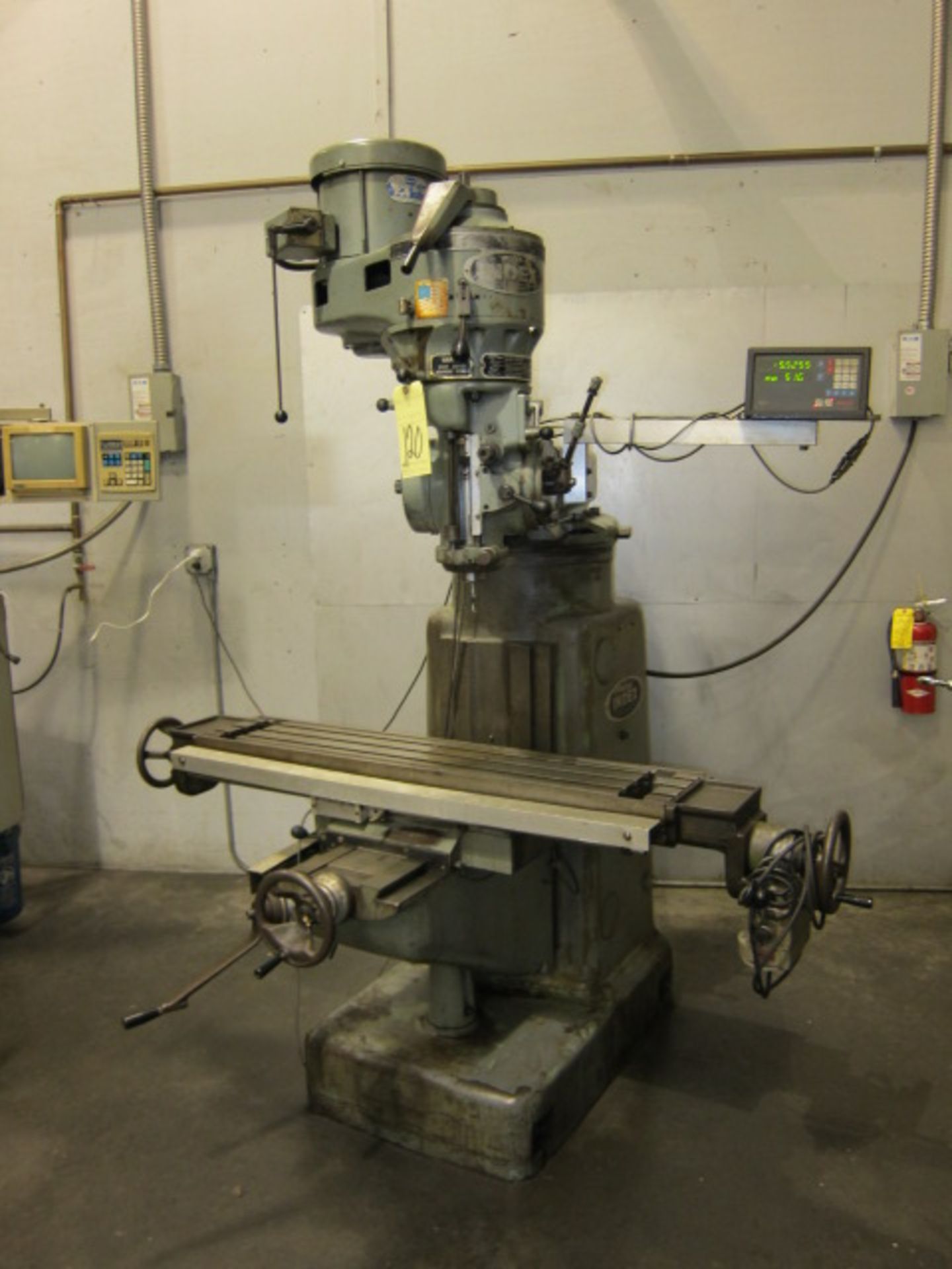 VERTICAL TURRET MILL, WELLS INDEX MDL. 847, 9" x 48" table w/pwr. feed, spds: 50-4200 RPM, 2-axis