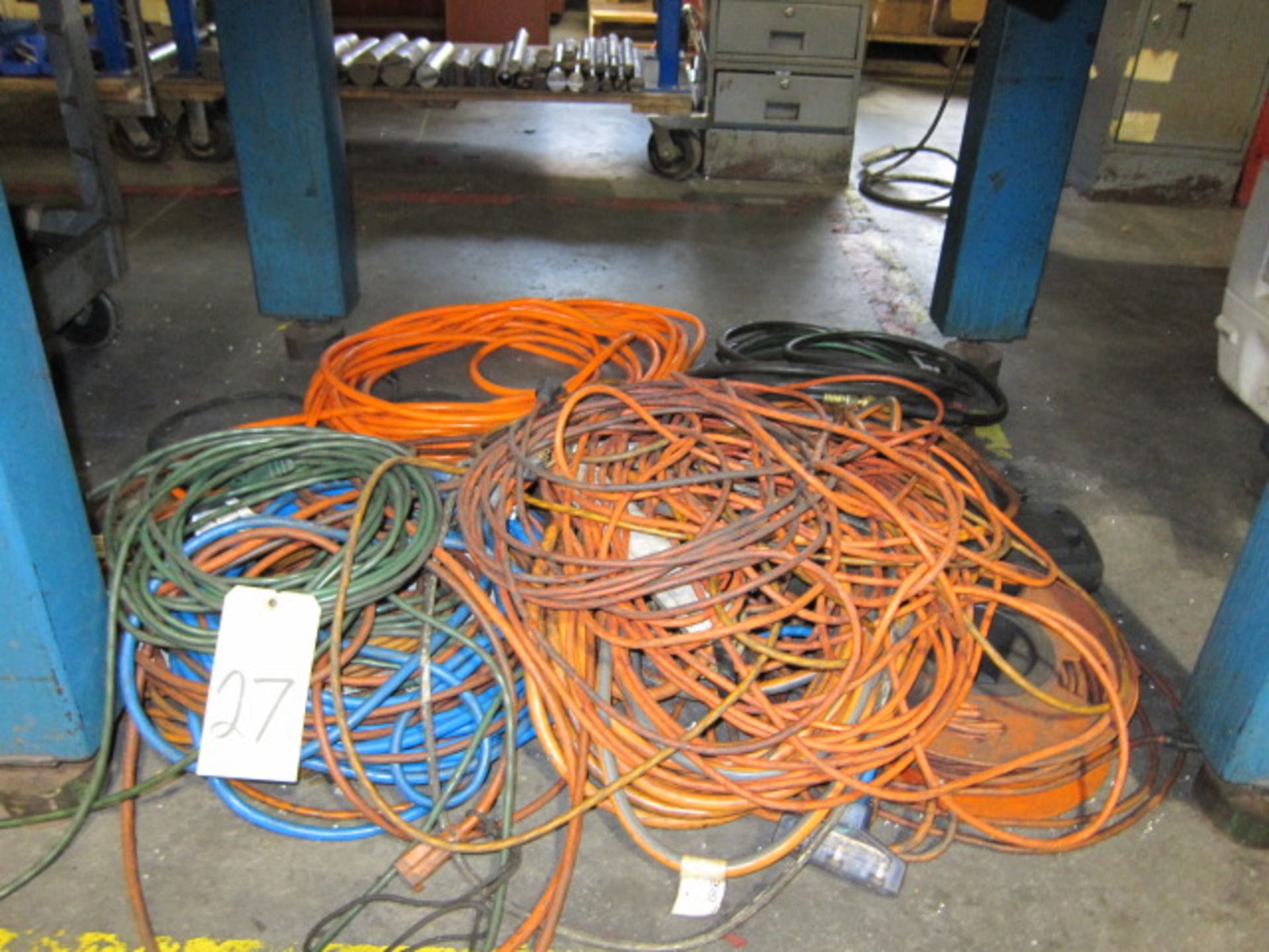 LOT OF EXTENSION CORDS, assorted (Located under bench)