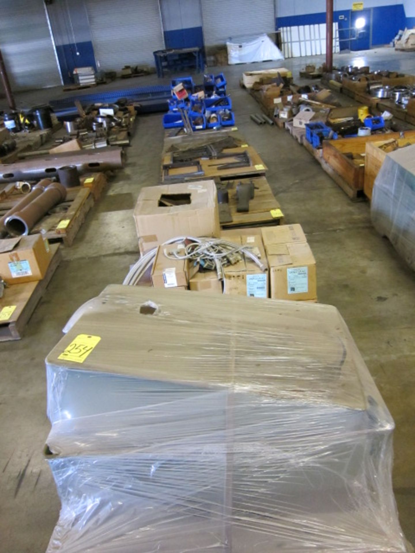 LOT CONSISTING OF: machine parts & hardware (on eight skids)