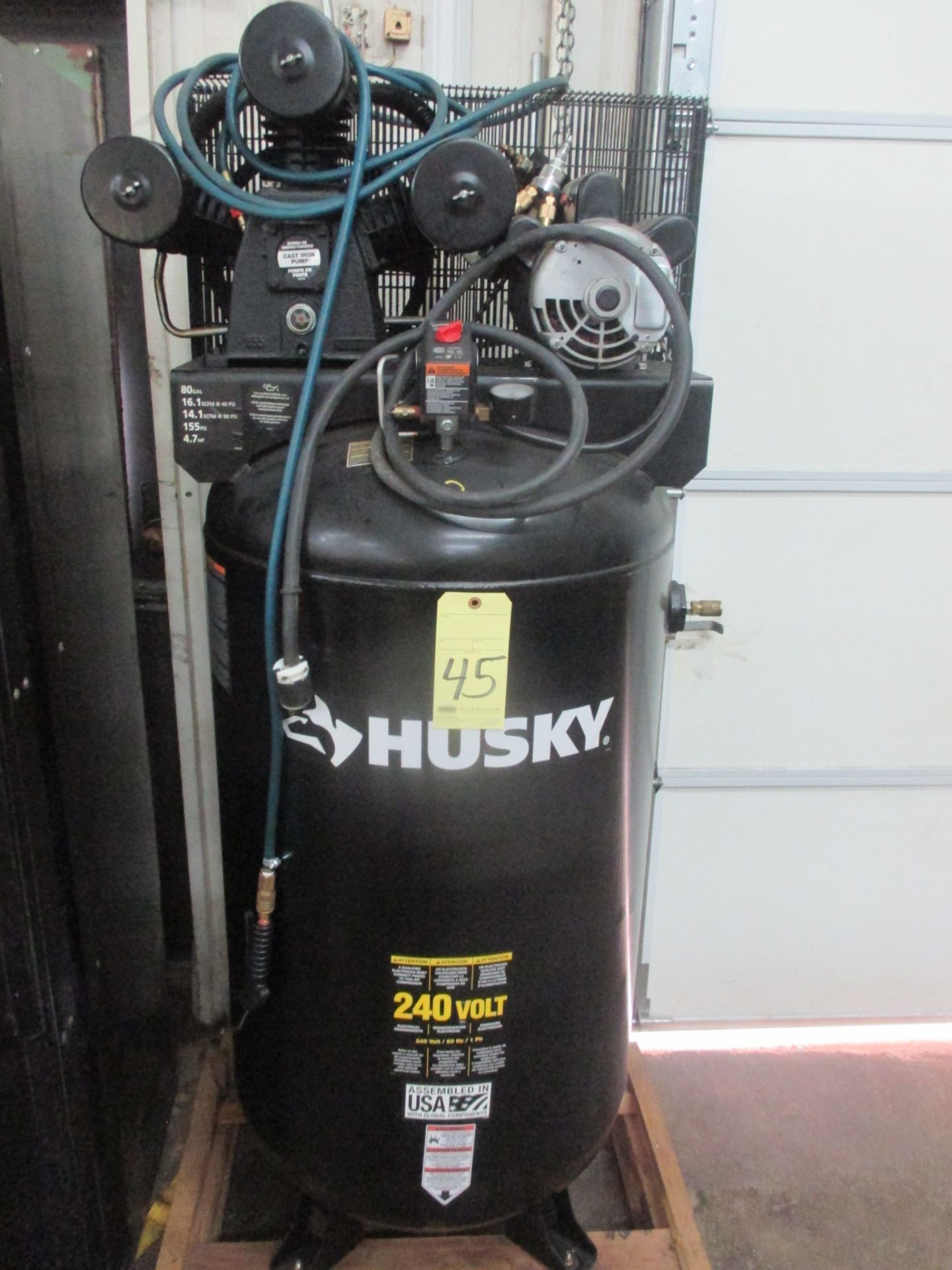 RECIPROCATING TYPE AIR COMPRESSOR, HUSKY, 5 HP motor, 80 gal. tank, vert. tank mtd., 16.1 SCFM @