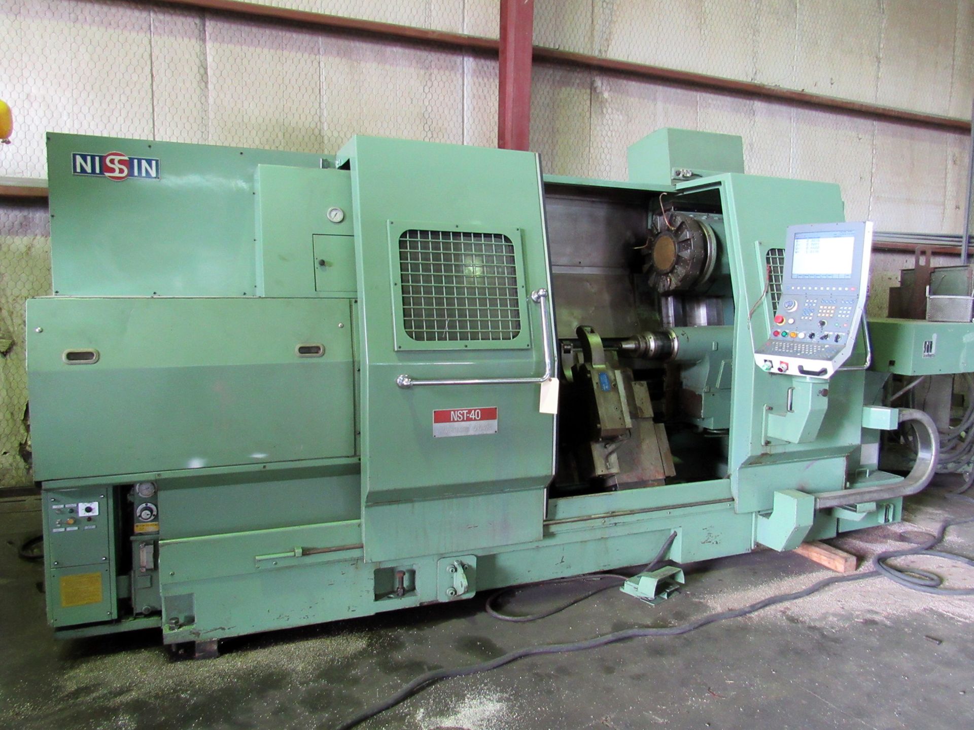NISSIN MDL. NST-40/125 CNC LATHE, rewired & retrofitted in 2010, NCT CNC control, 26” sw. over - Image 2 of 8