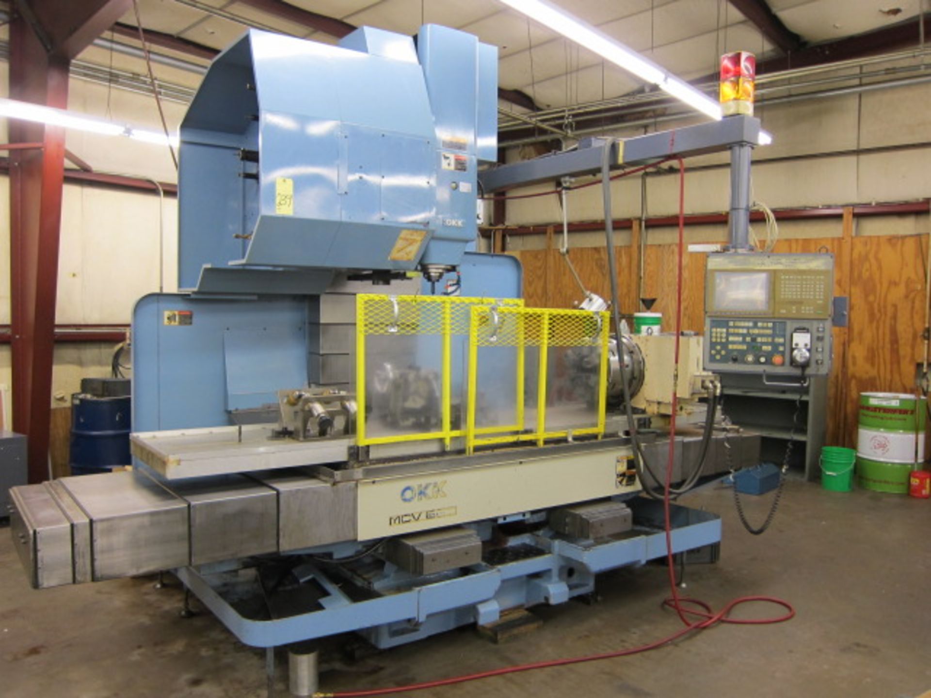 CNC VERTICAL MACHINING CENTER, OKK MDL. MCV-660, OKK CNC control, 26” x 67” table, 59” X-axis