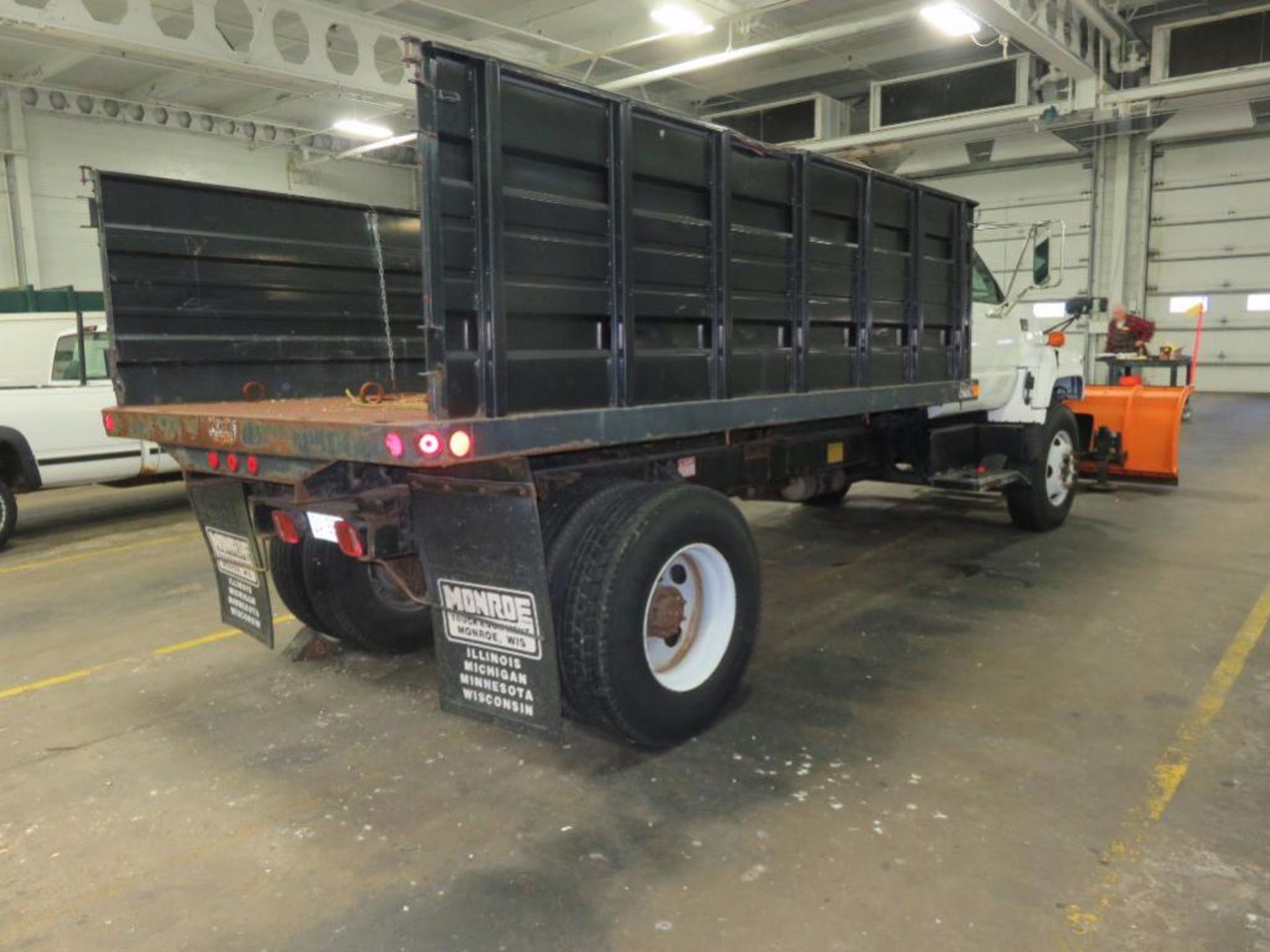 2002 GMC 14 ft. Single-Axle Stake/Dump Truck Model C7500, VIN 1GDL7H1E62J504353 (in loading dock) ( - Image 6 of 7