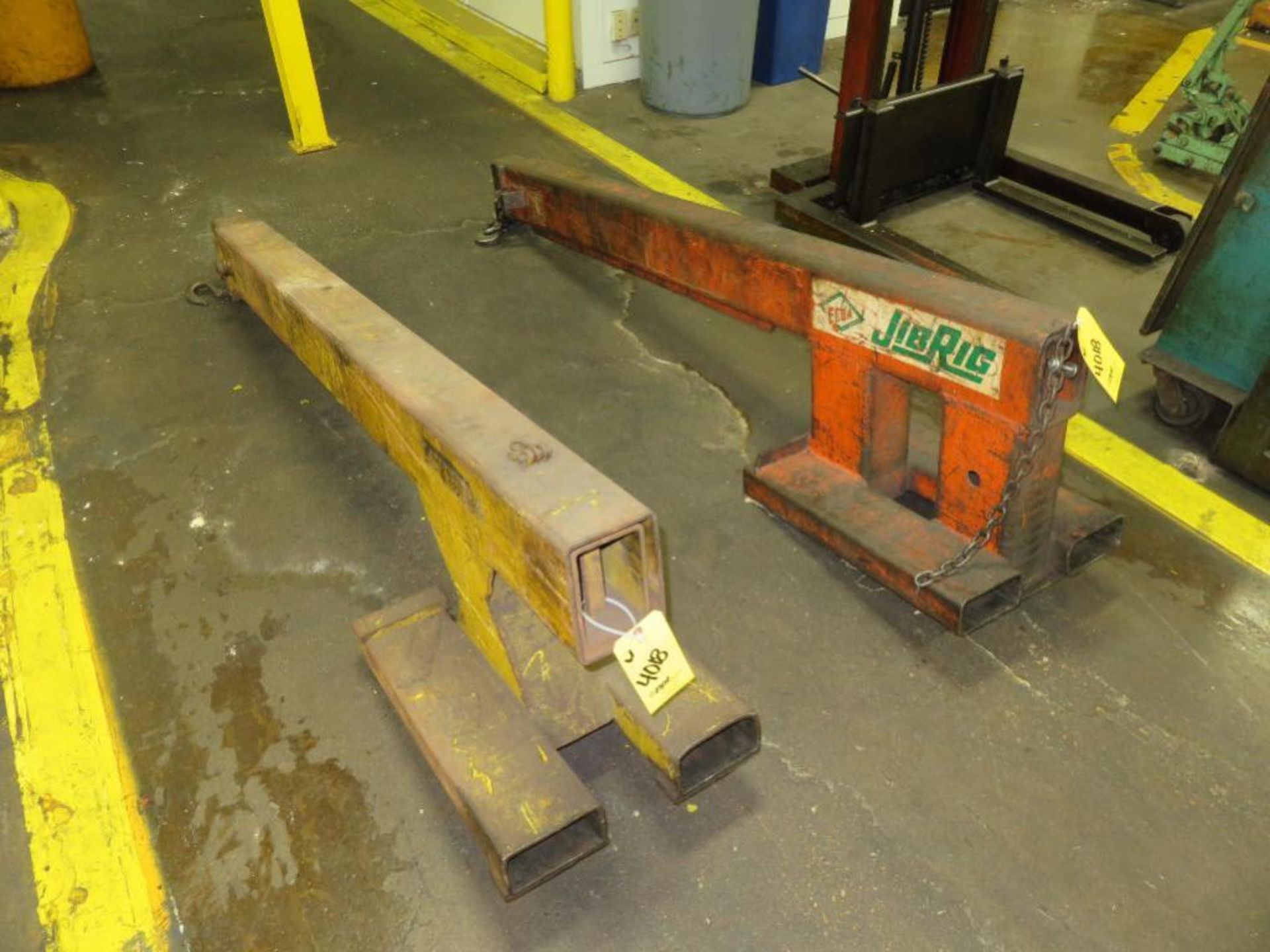 LOT: (2) Forklift Fork Telescoping Booms, (2) Double Barrel Lifts, (1) Barrel Lift, (1) Fixture, (