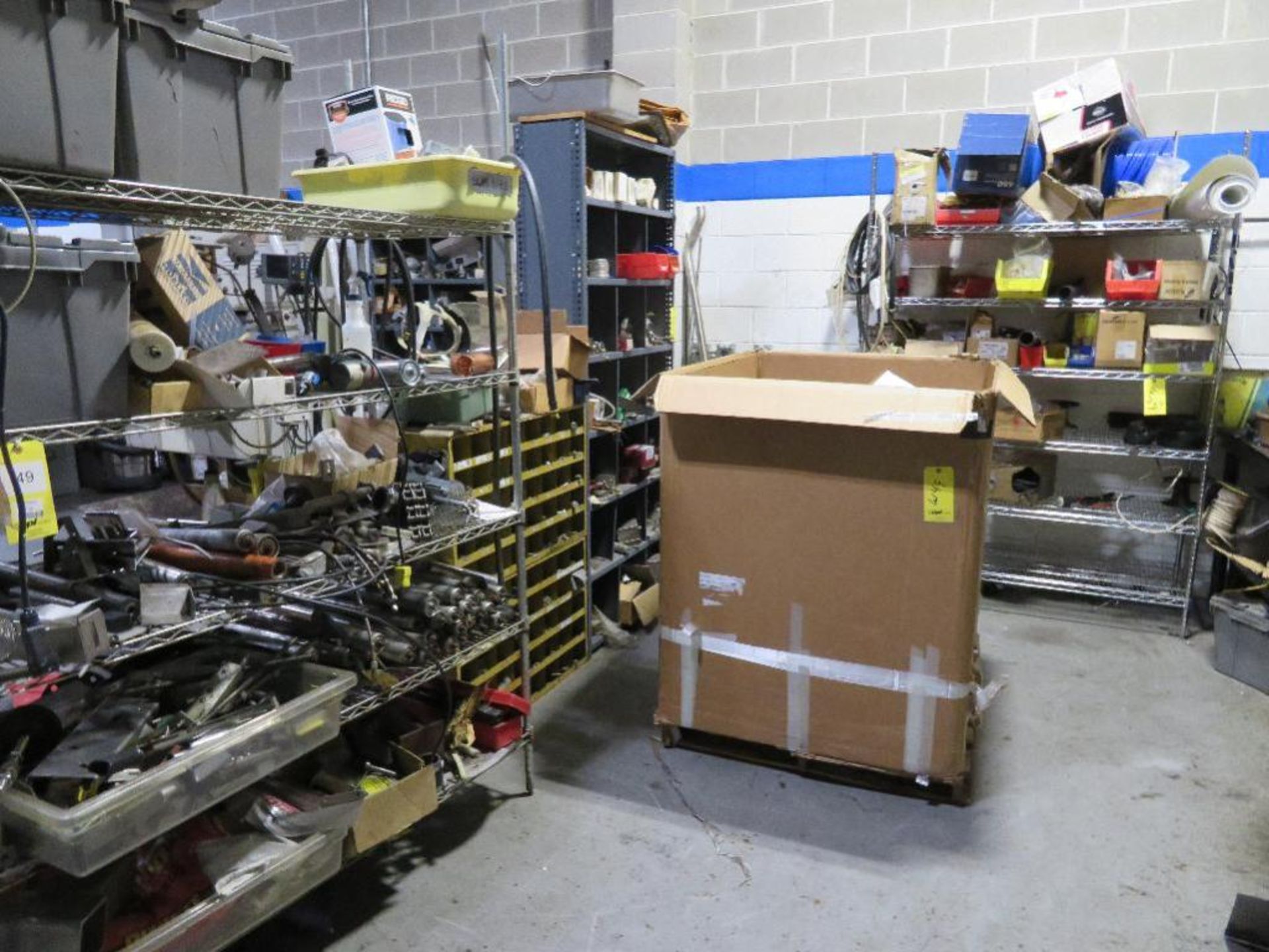 LOT: 48 in. x 96 in. Steel Table with Vise & Shelving Units with Contents of Conveyor Parts, Bearing - Image 2 of 3