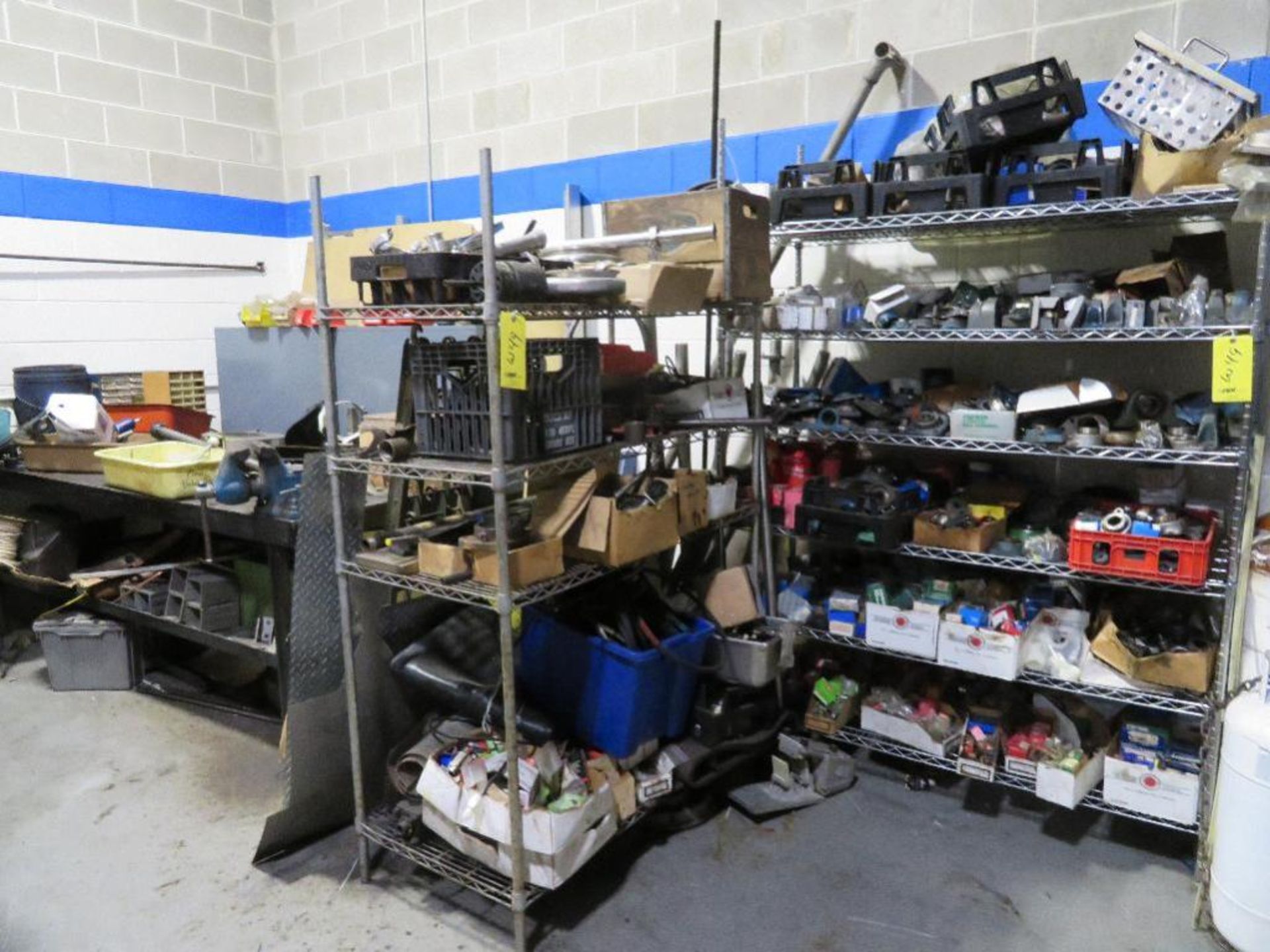 LOT: 48 in. x 96 in. Steel Table with Vise & Shelving Units with Contents of Conveyor Parts, Bearing