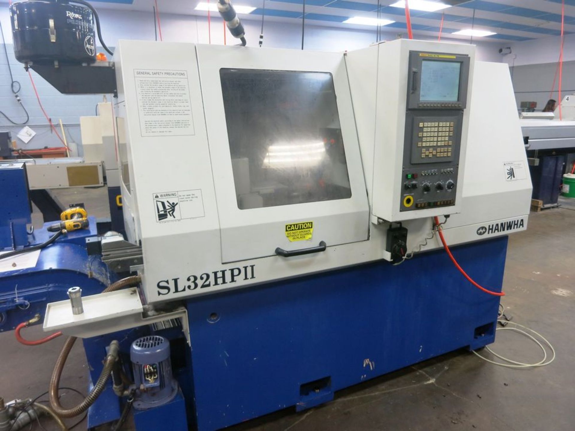 32MM Hanwha SL-32HPII 7-Axis CNC Swiss Type Sliding Headstock Automatic Lathe, S/N SL-32B4-1052, New