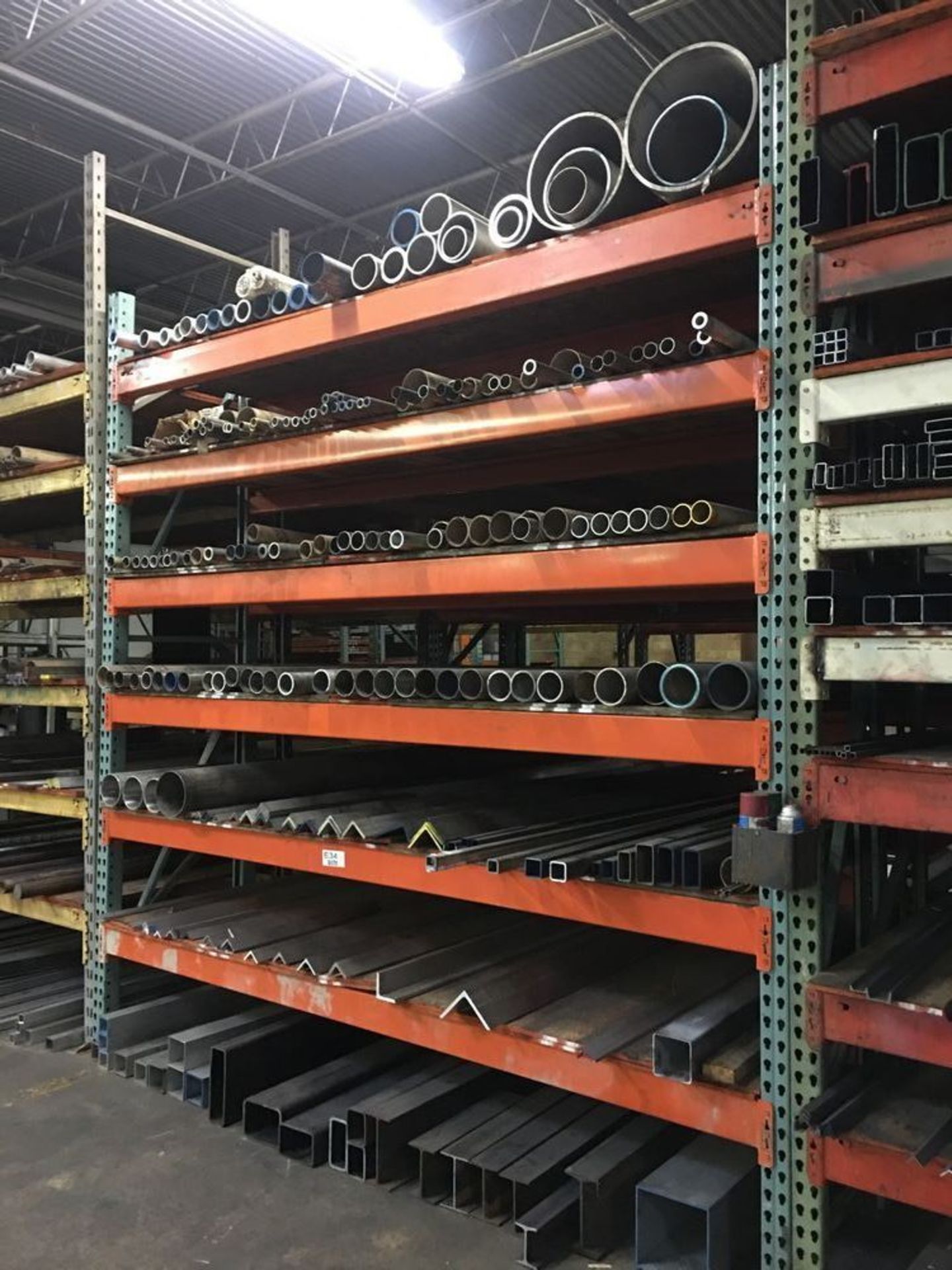 Pallet rack (no contents) 10' tall x 9' arms