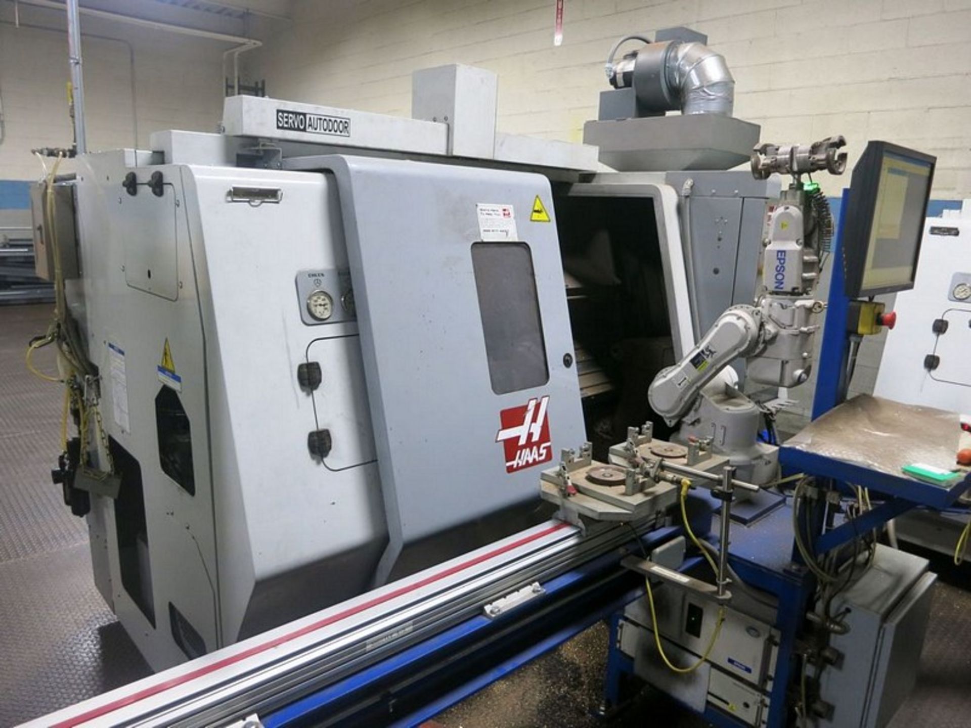 Haas SL-20T CNC 2-Axis Turning Center Lathe w/Epson 6 -Axis Material Handling Robot, S/N 3084991,