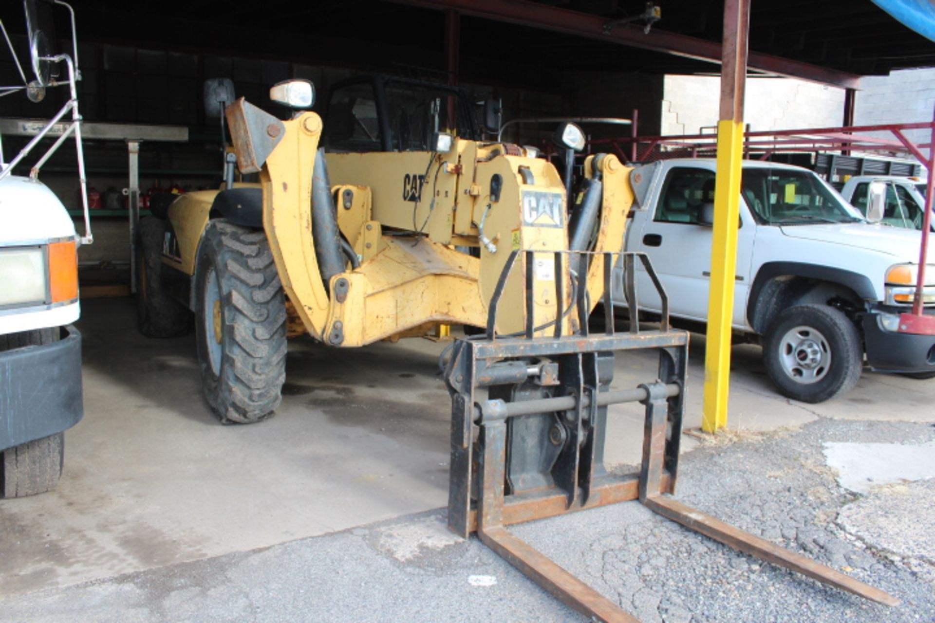 CATERPILLAR TH460B ROUGH TERRAIN TELESCOPIC LIFT, 3,699 HOURS, S/N CATTH460B, EXTENDED REACH ATTMT.