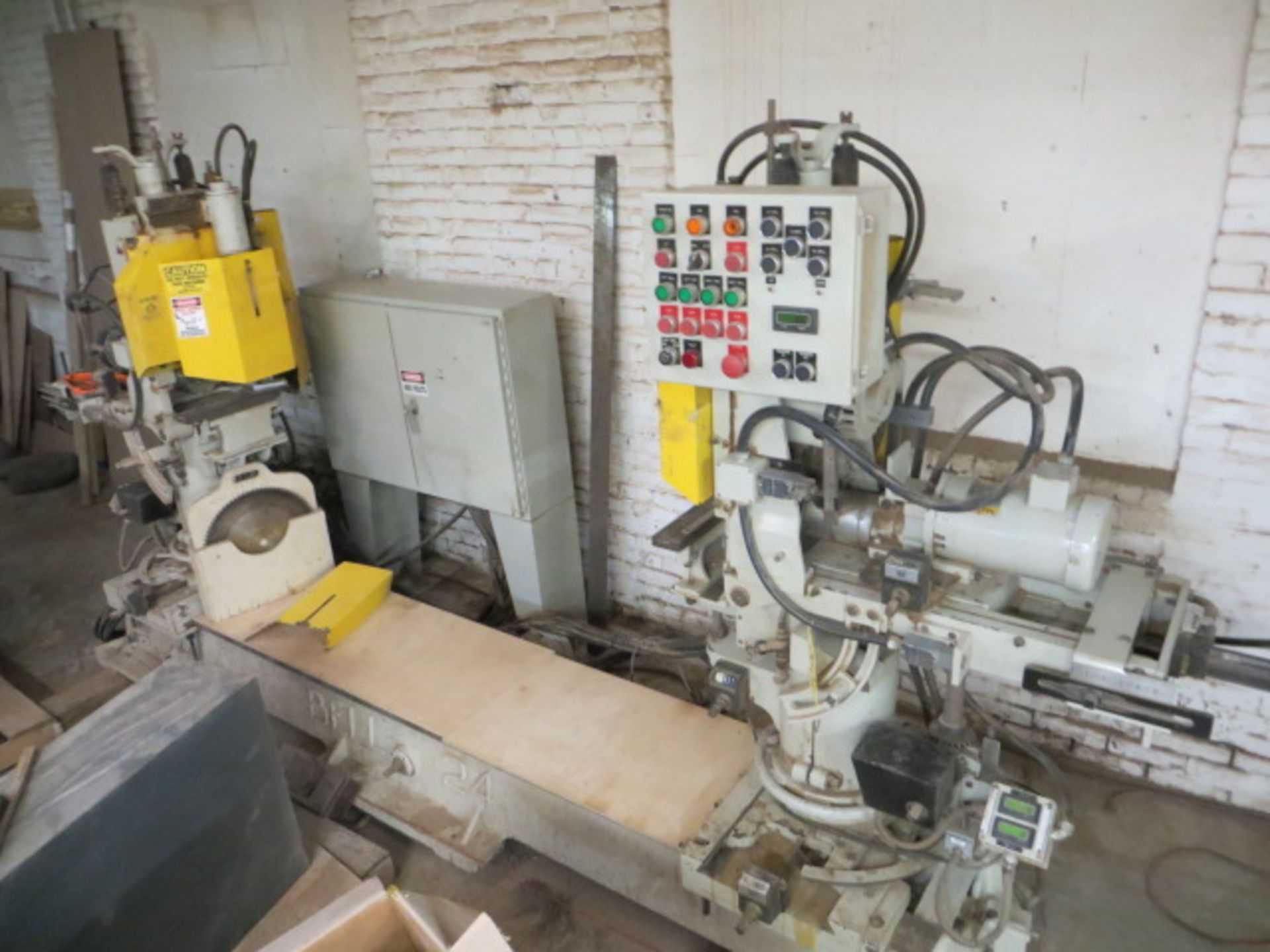 BELL 24 TWIN MITRE SAW W/HOR. TWIN DRILLING UNITS