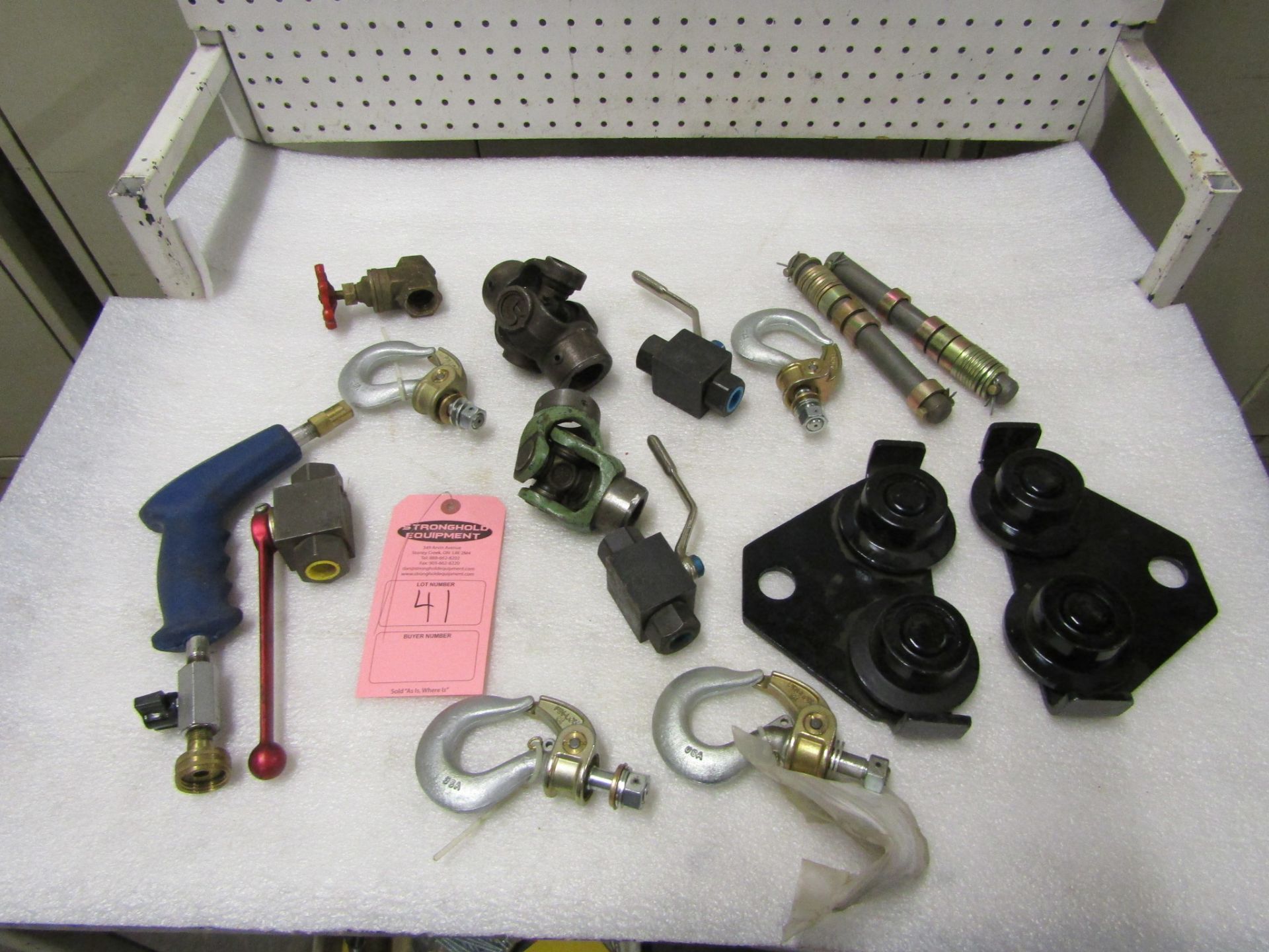 Lot of Lifting hoist hooks and trolley with assorted valves and sprayer