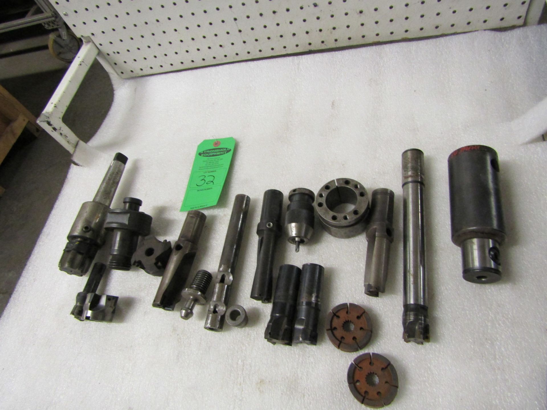 Lot of tooling including cutter heads, drill chucks, drill bits and more