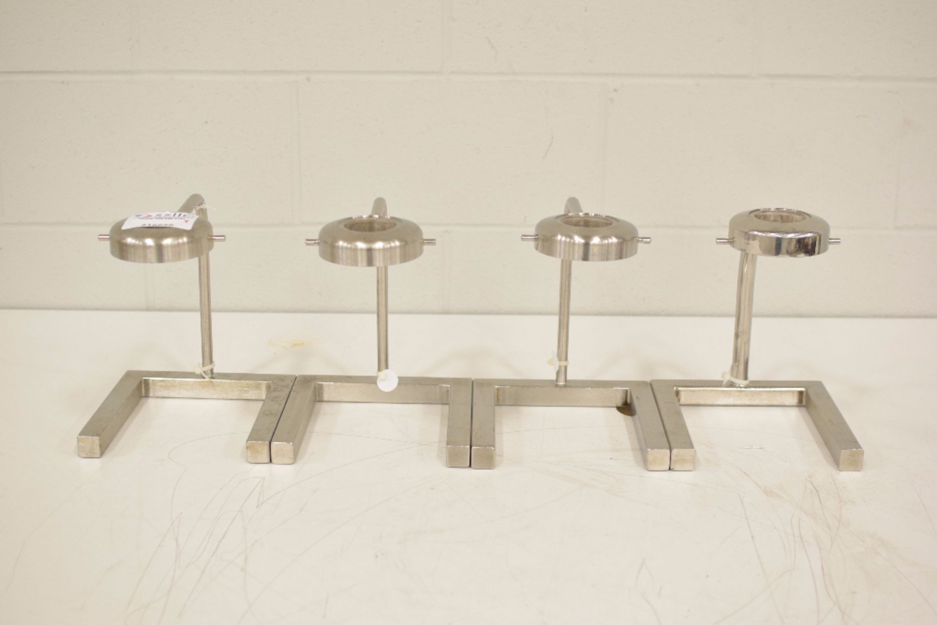 Lot of (4) Stainless Steel Bottle Stands