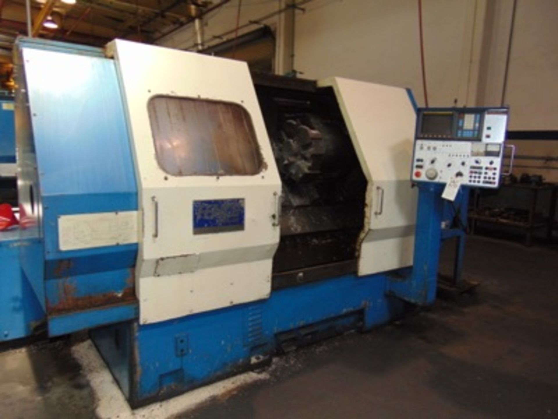 1988 Femco mod. WNCL35/60 CNC Turning CTRw/ Fanuc OT CNC Controls, 24" Swing x 26" Center, 11.5" x