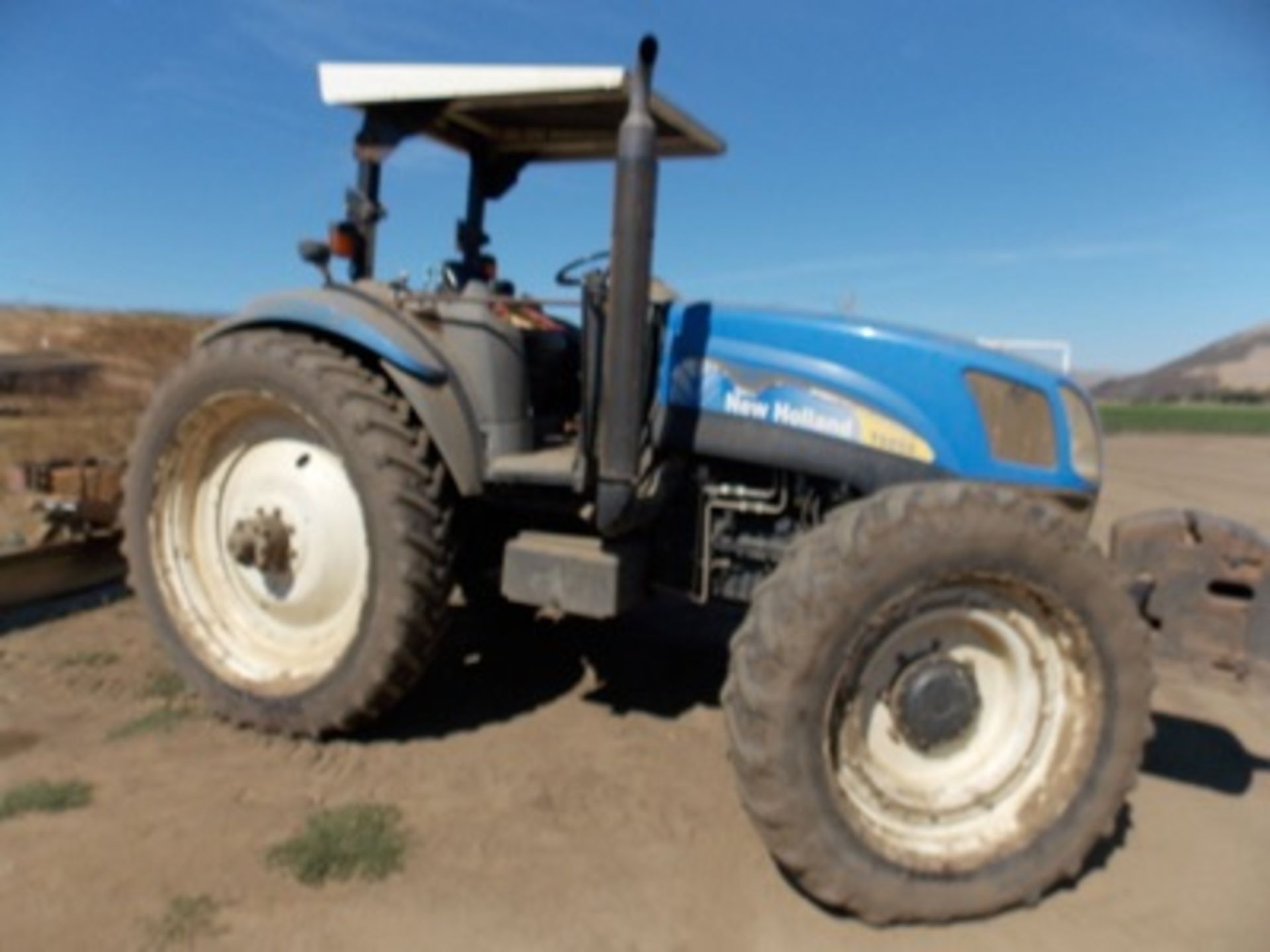 (2008) New Holland mod. T6050, 4WD, Farm Tractor, 8-Spd Low & High, 3pt. Hitch, Hrs: 7509;