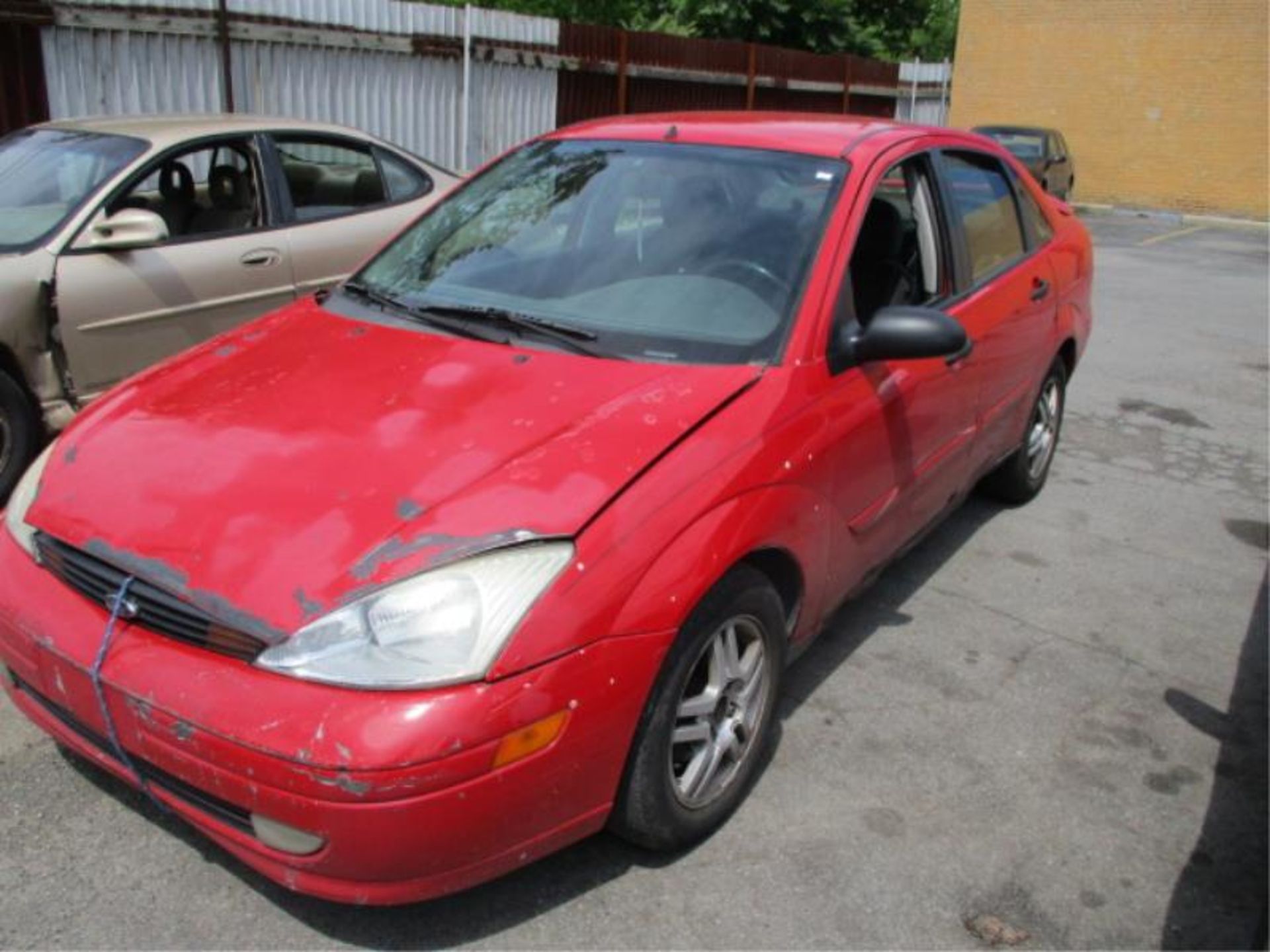 2001 Red Ford Focus VIN:1FAP34321W358037 (209,310 miles)