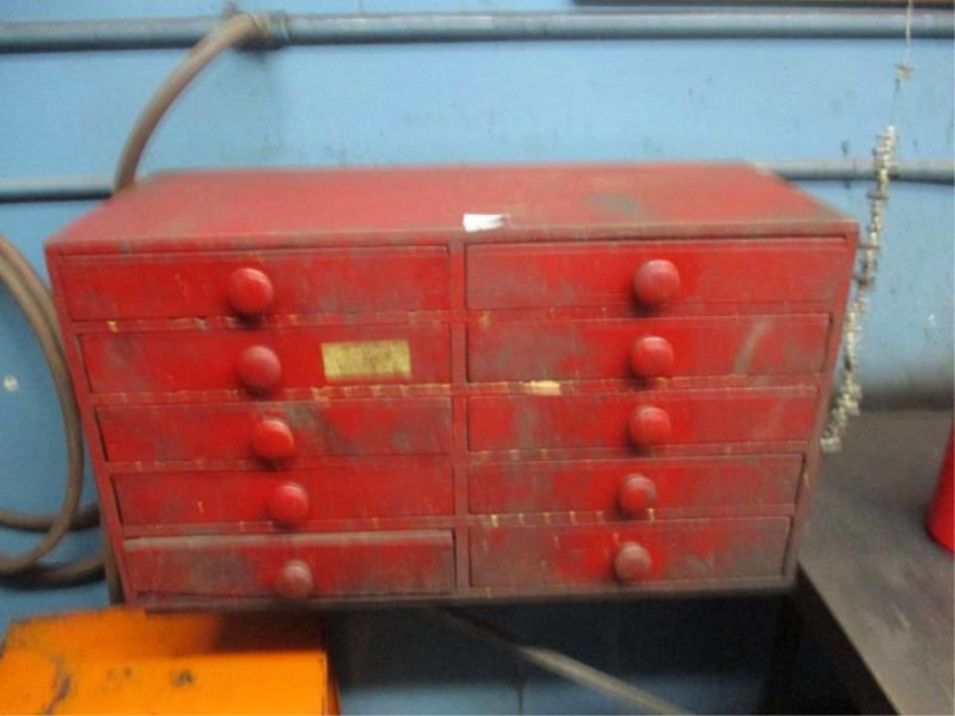 10 Drawer Red Paint Cabinet