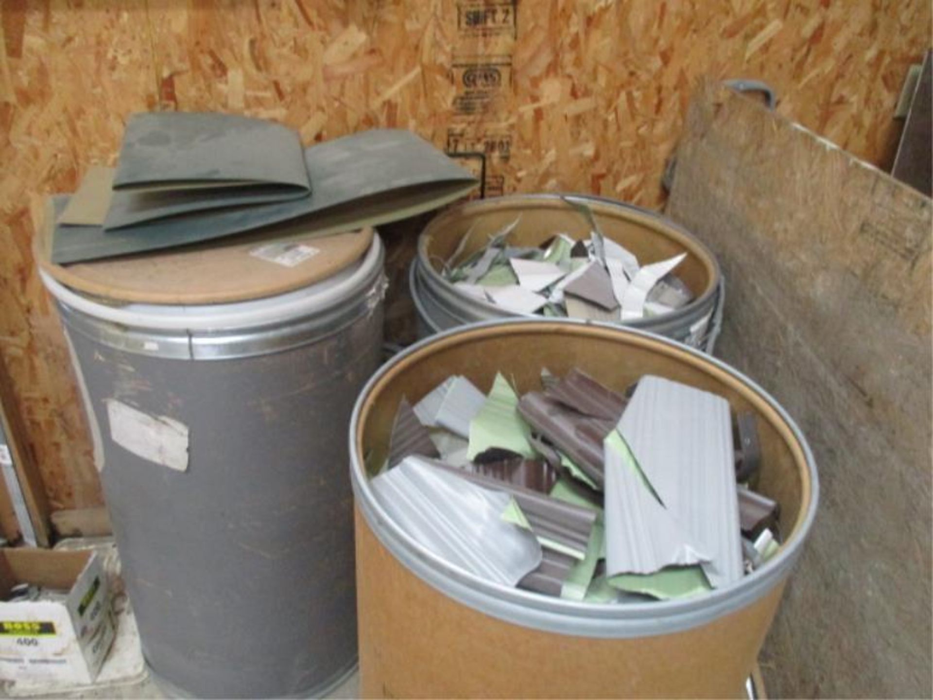 2 Barrels of Scrap Aluminum Siding and half Barrel of Cans