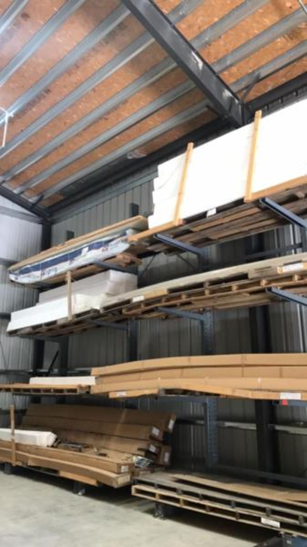 Two sections of cantilever heavy duty racking, Four tier: No contents