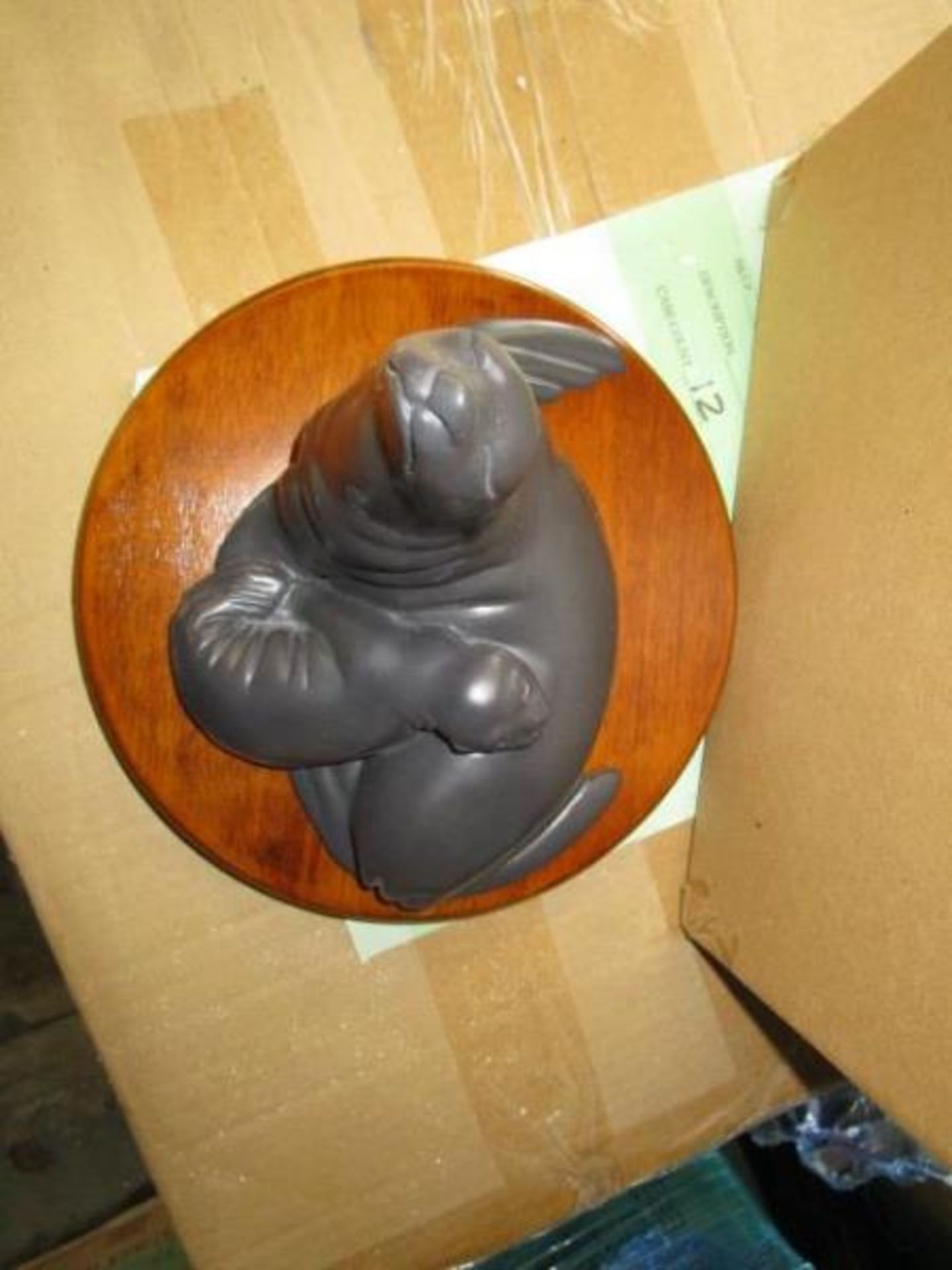 Pallet of 64 Touch Me Seal Sculptures, plaque reads Touch Me TM Katherine Tod Johnstone, signed on