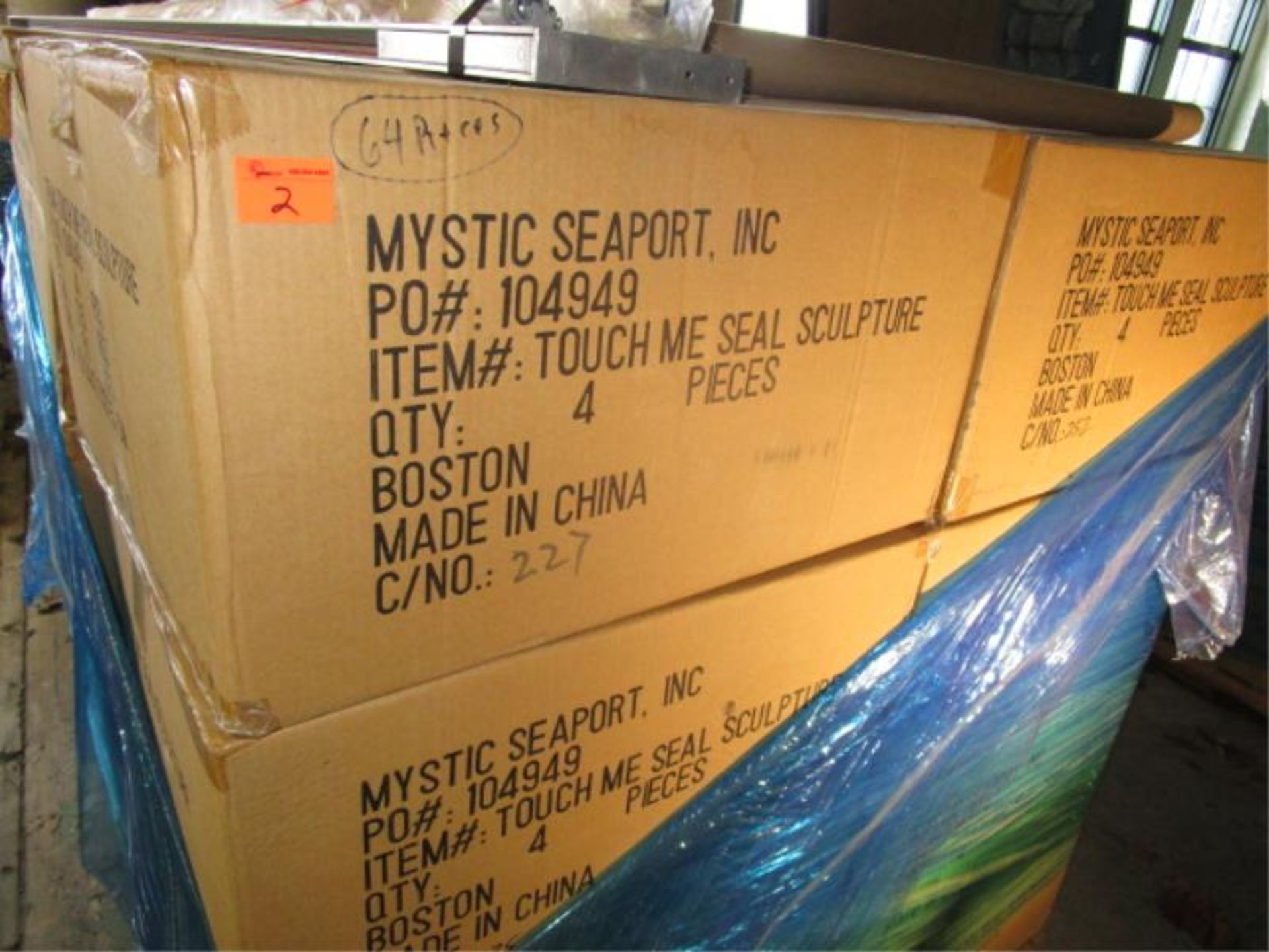 Pallet of 64 Touch Me Seal Sculptures, plaque reads Touch Me TM Katherine Tod Johnstone, signed on