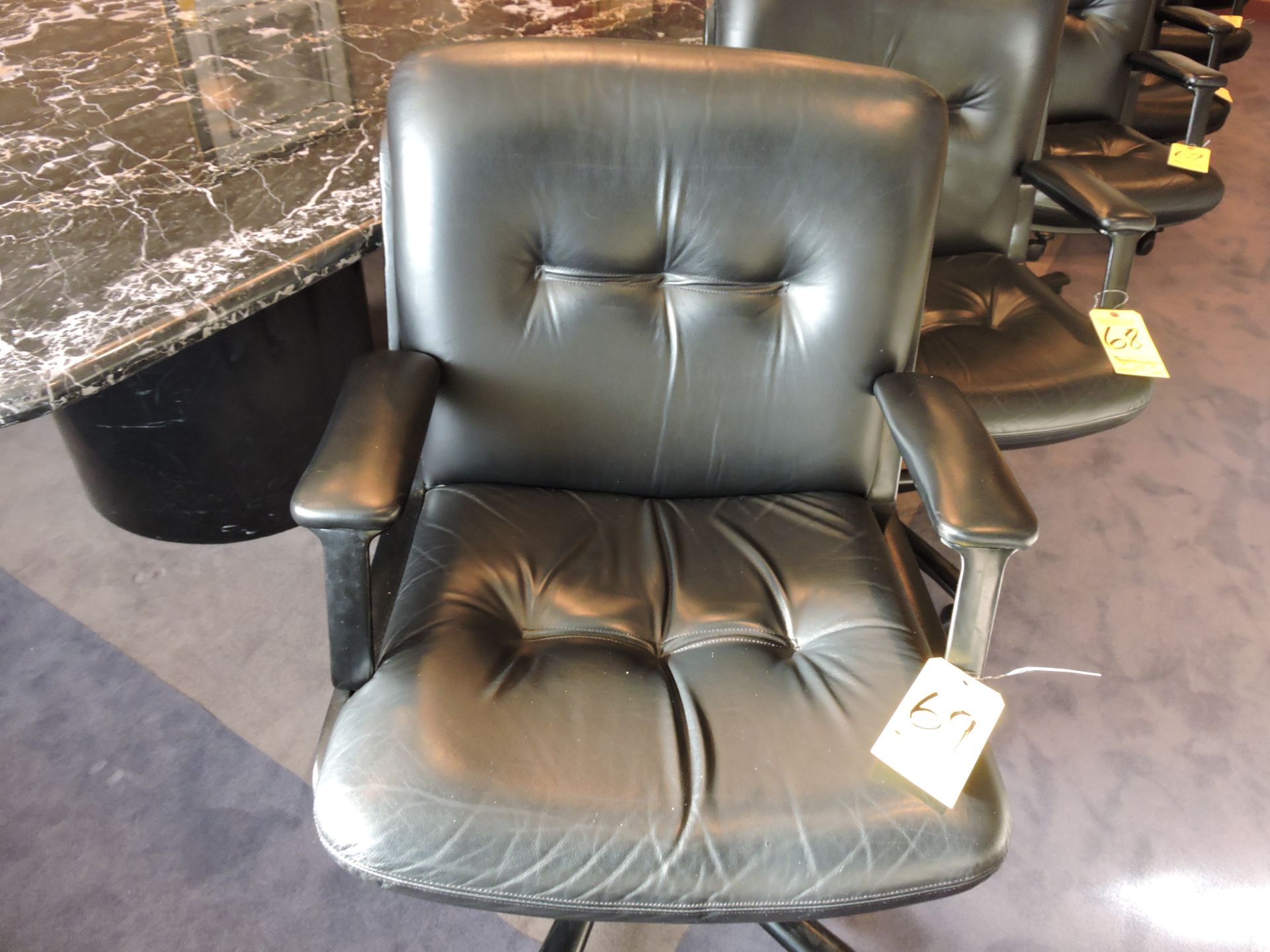 Leather Swivel Arm Chair