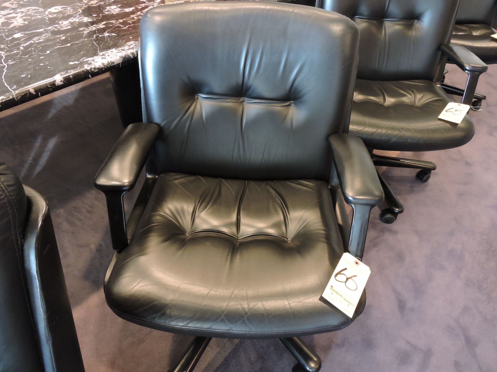 Leather Swivel Arm Chair