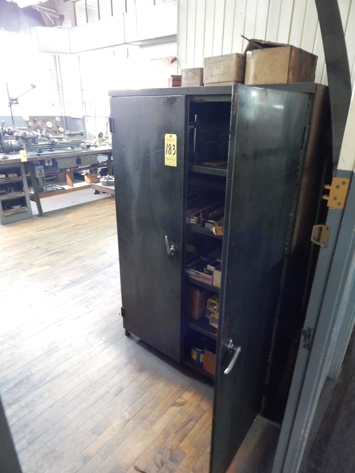 2-Door Metal Upright Storage Cabinet and Contents