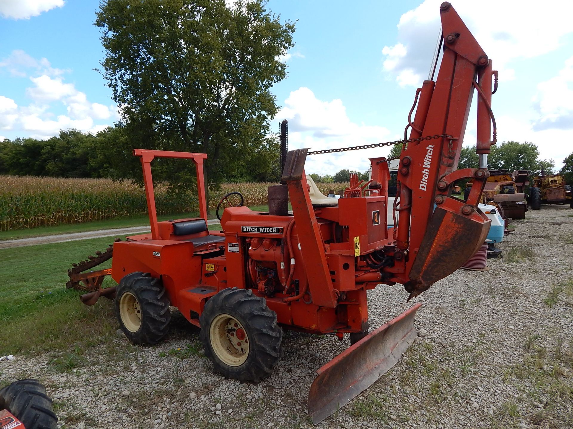 Ditch Witch R65 4 x 4 Trencher w/ 7 ft Depth, 308 Hours, Backhoe Attachment w/ 18 in Bucket, 6 ft