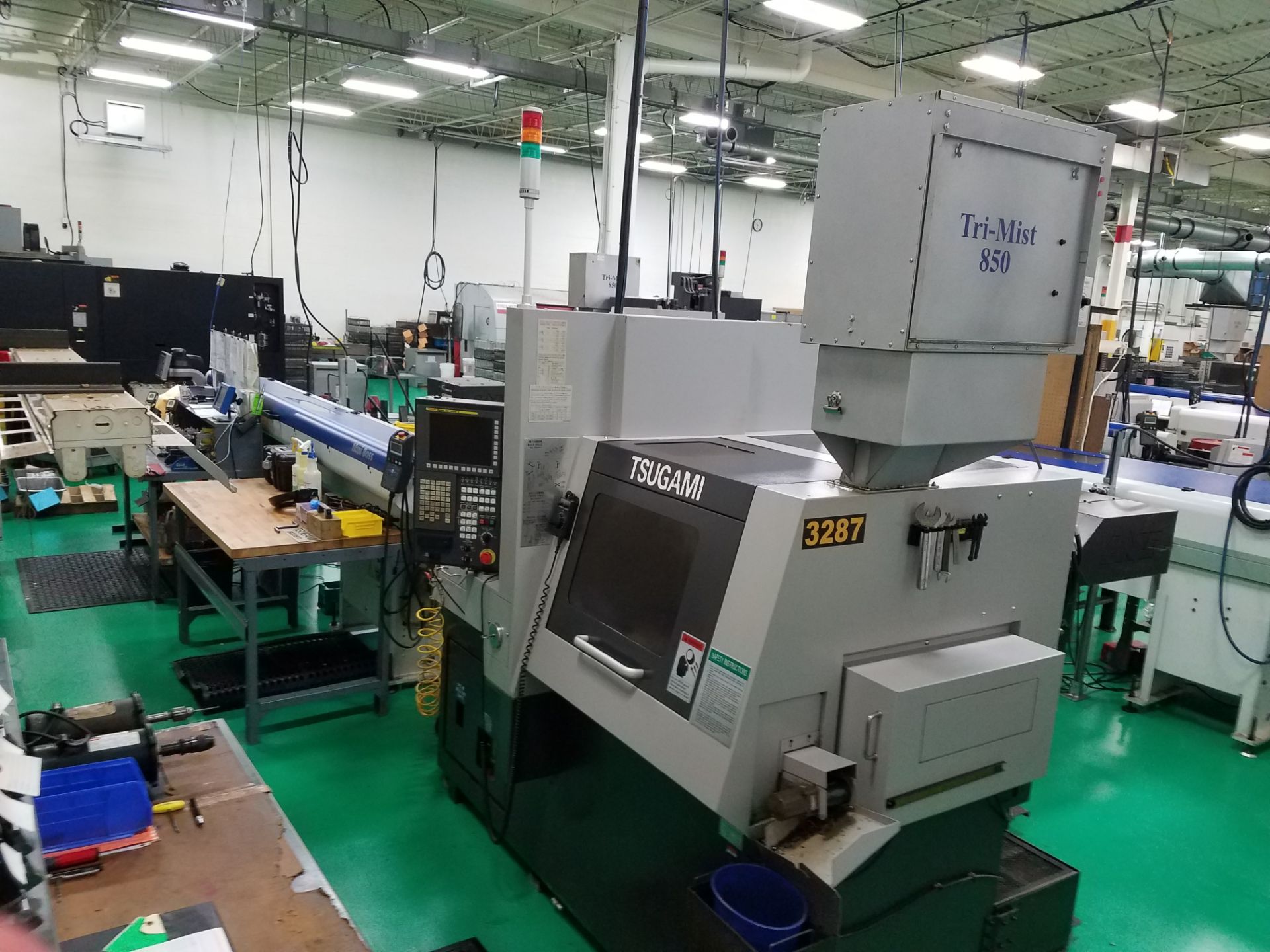 Tsugami Model SS-32 CNC Swiss Type Screw Machine, s/n 312, New 2011, Fanuc 32iT-B CNC Control, 7-