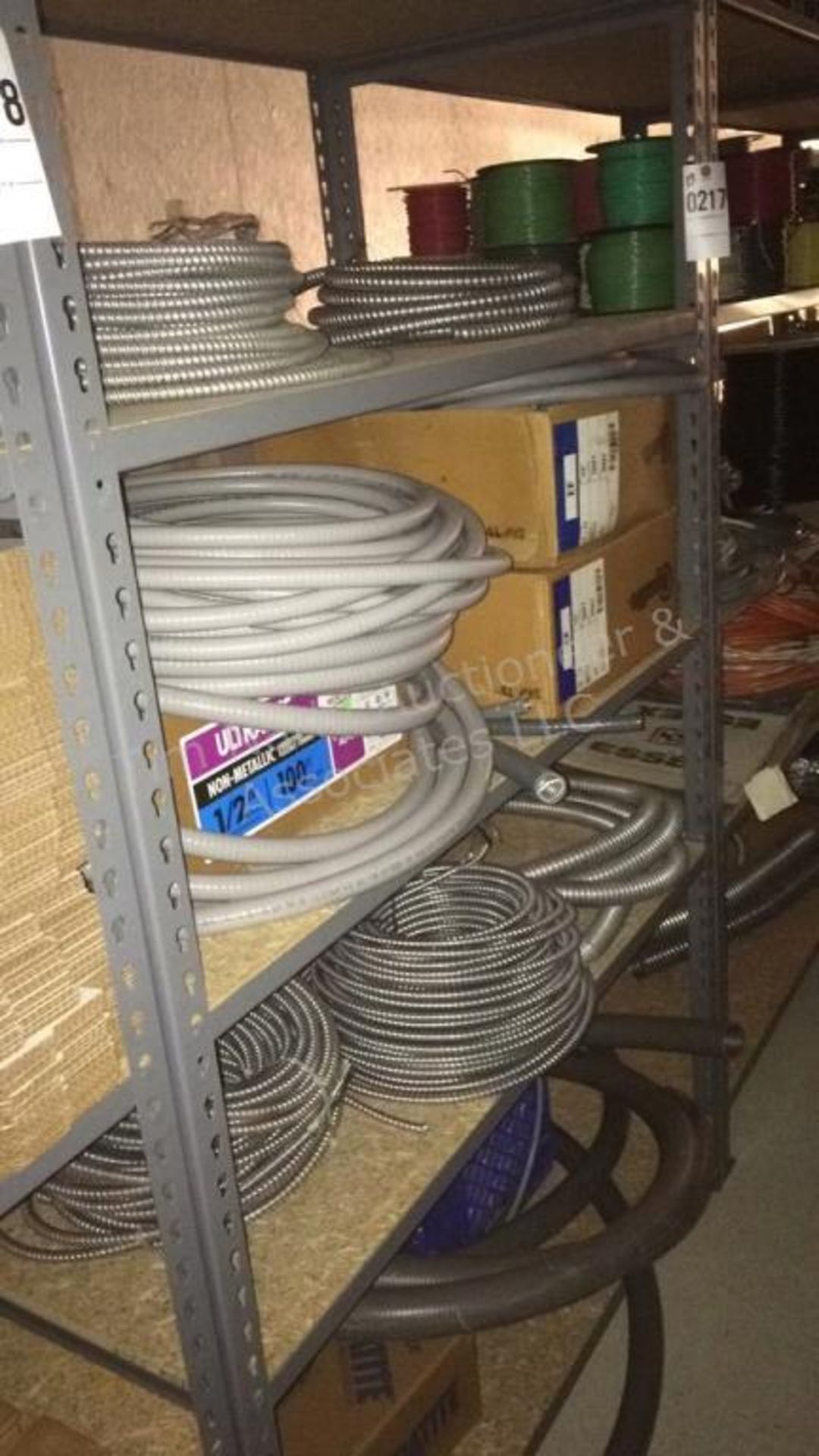 B: contents of shelves – flex conduit & wire - Image 2 of 12