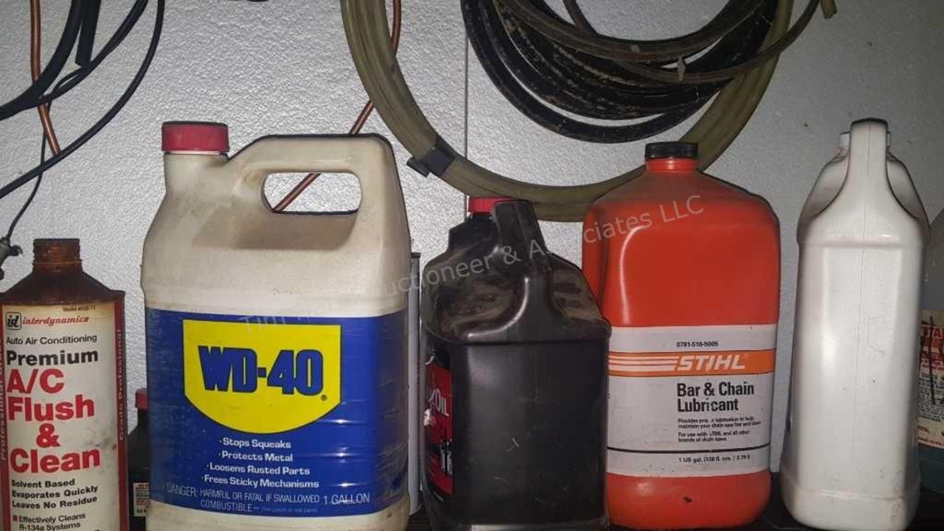 Contents of wall over bench: garage fluids & - Image 7 of 9