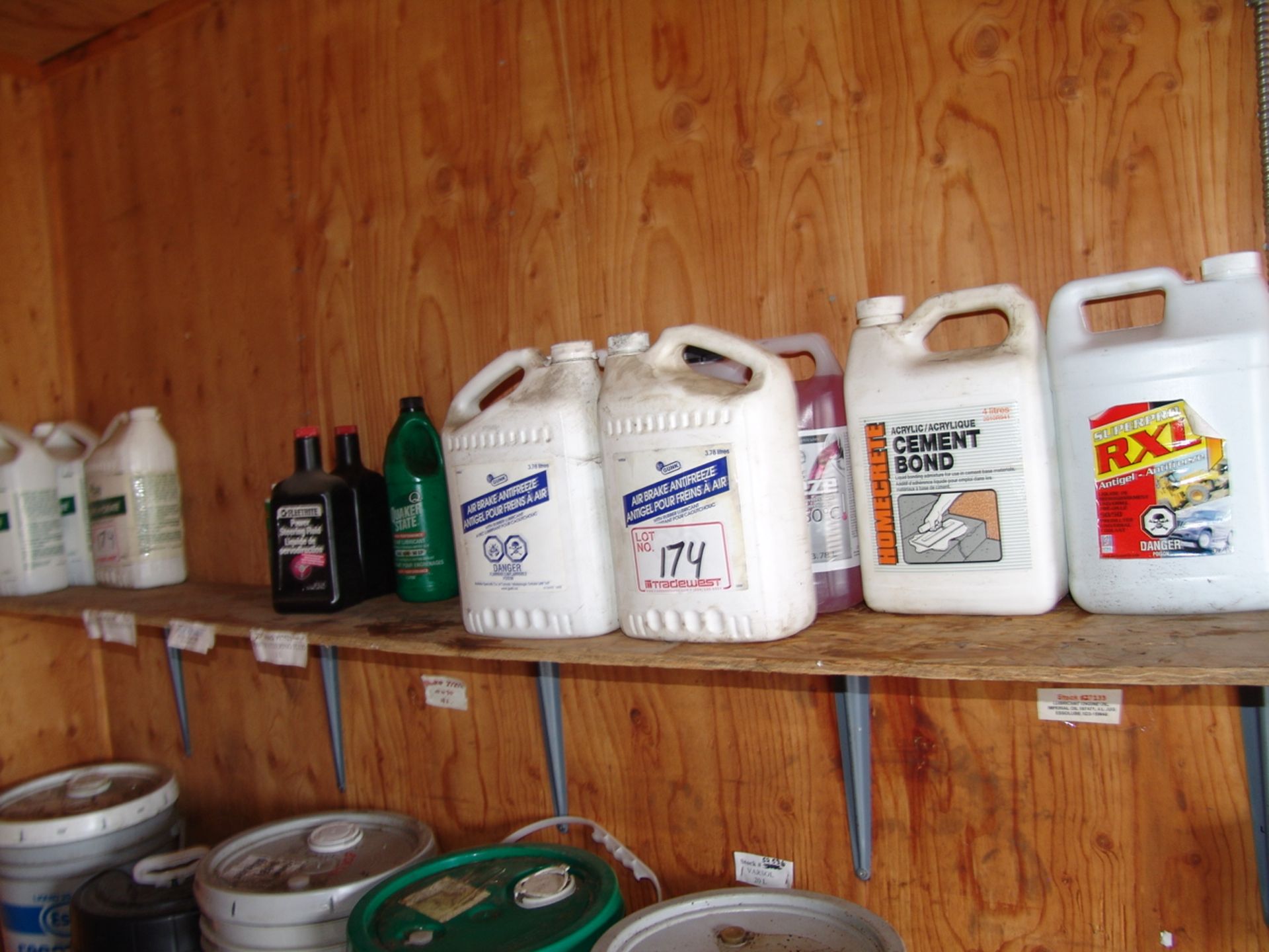 SHELF OF PAINT THINNER, ANTIFREEZE