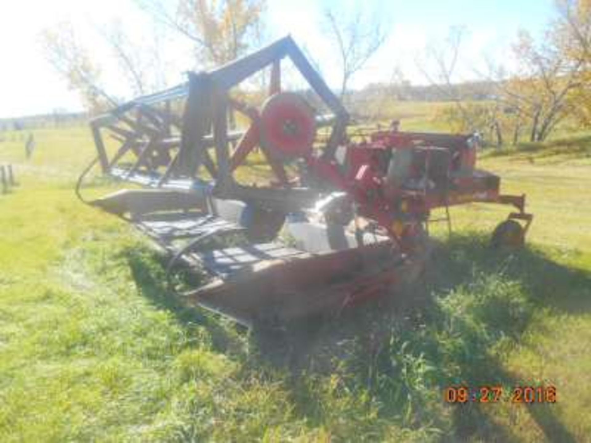 White 24ft pto swather (good)