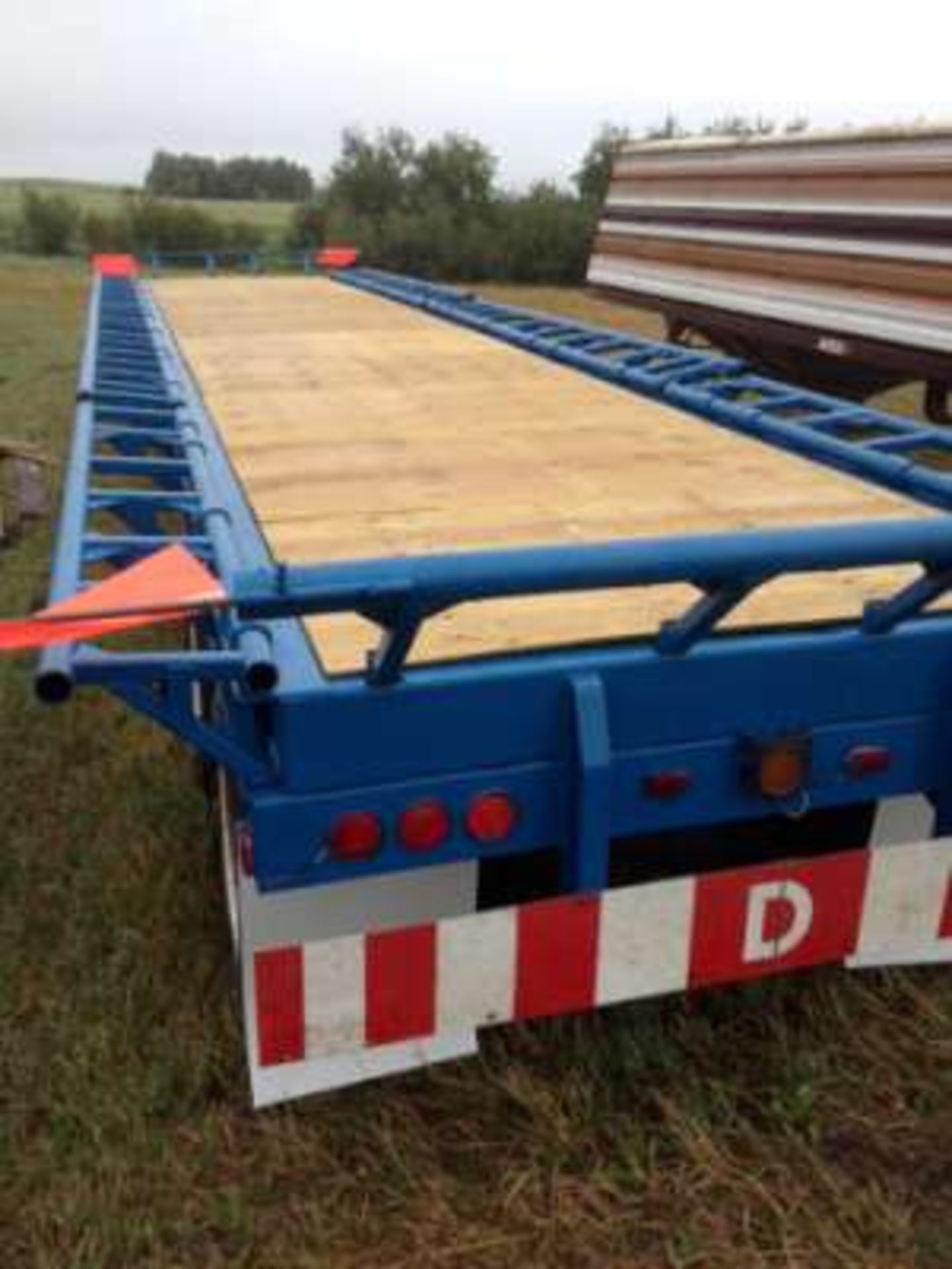 1970’s Fruehauf highboy trailer, w/bale extensionss/n 32X742709 (Previously registered in Sk)