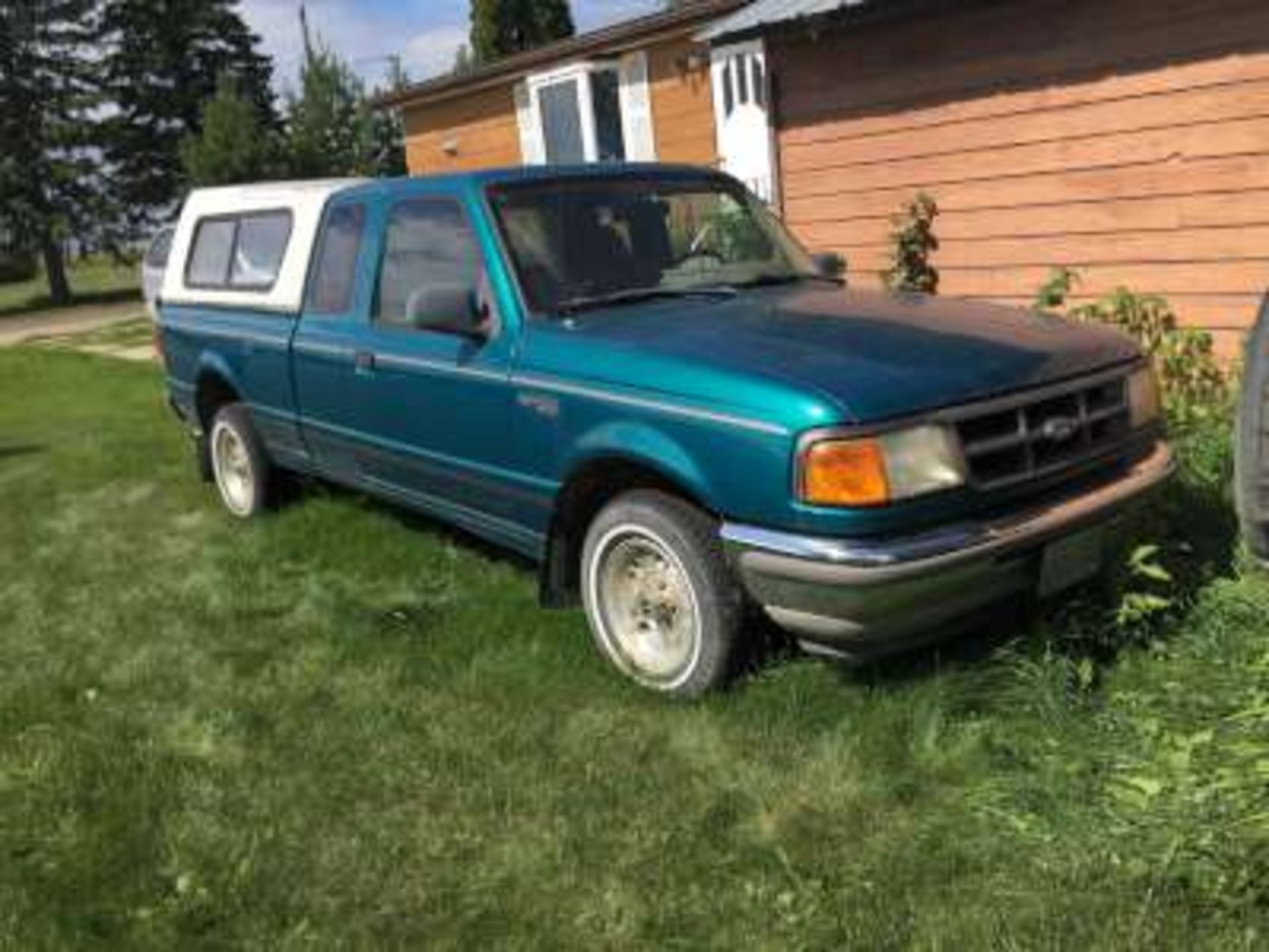 1993 Ford Ranger XLT Truck: topper, 4 L Auto, 2WD, super cab,very clean, s/n 1FTCR14X5PPA22500,