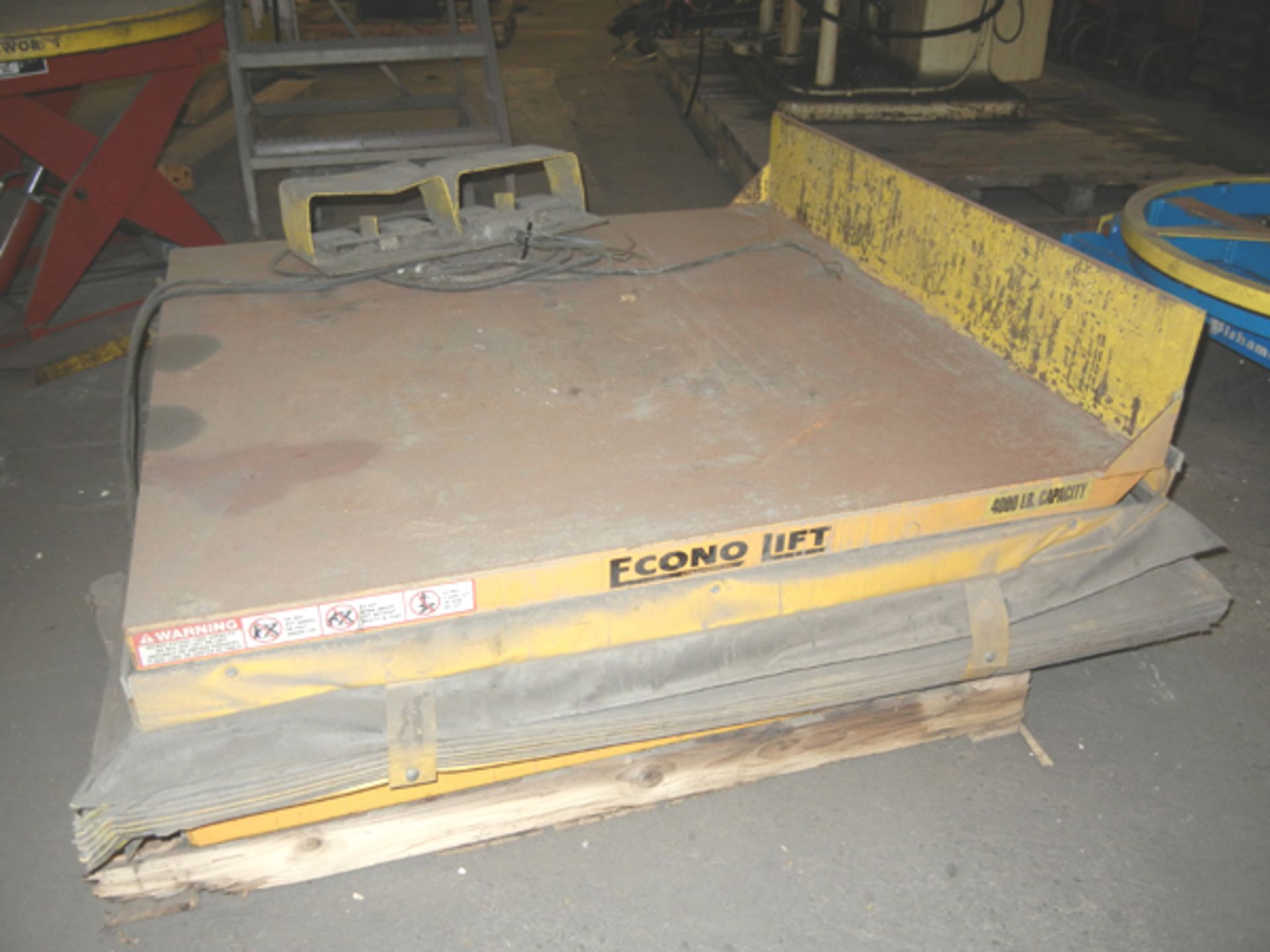 Econo Lift 4,000 lb capacity Lift Table with foot pedal controls, 48" x 48" platform