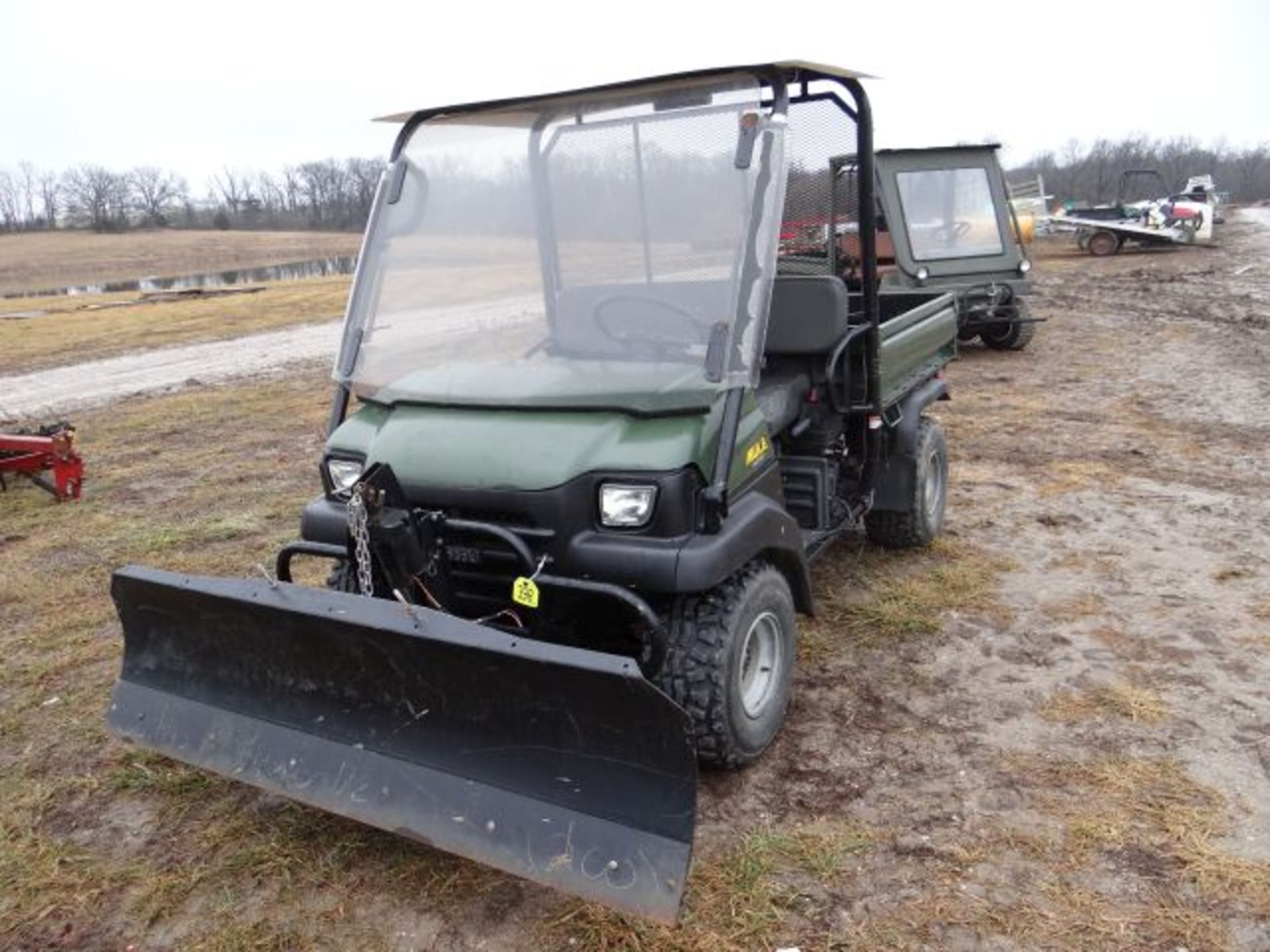 Kawasaki 3010 Mule, 2007 #112654, 960 hrs, Snow Blade, Power Lift, 4wd, Poly Windshield and Roof