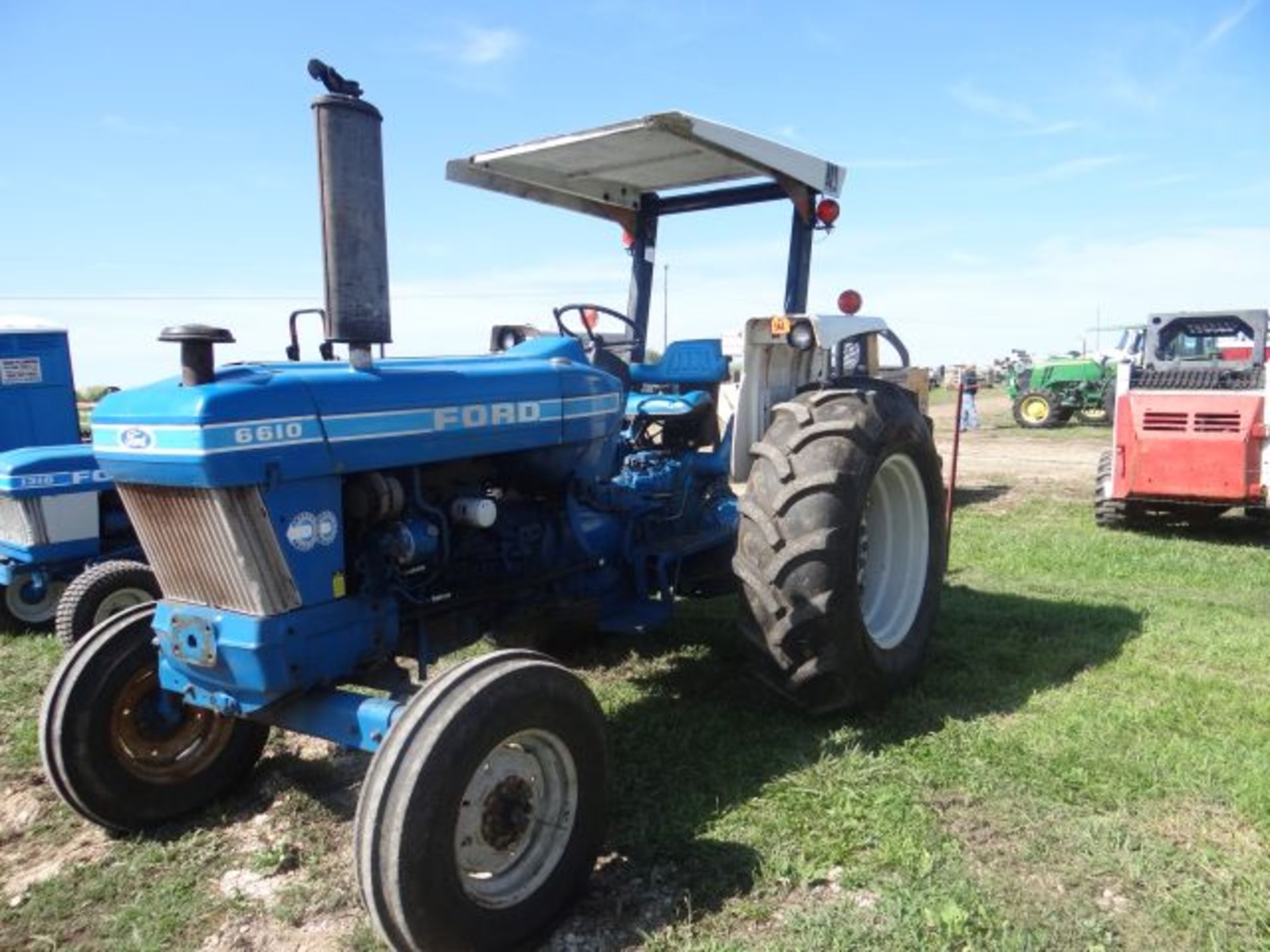 Ford 6610 Tractor Shows 5200 hrs, 2wd, OS w/ROPS and Canopy, 3pt, PTO, 2 SCVs, 18.4x30 Rear Tires,