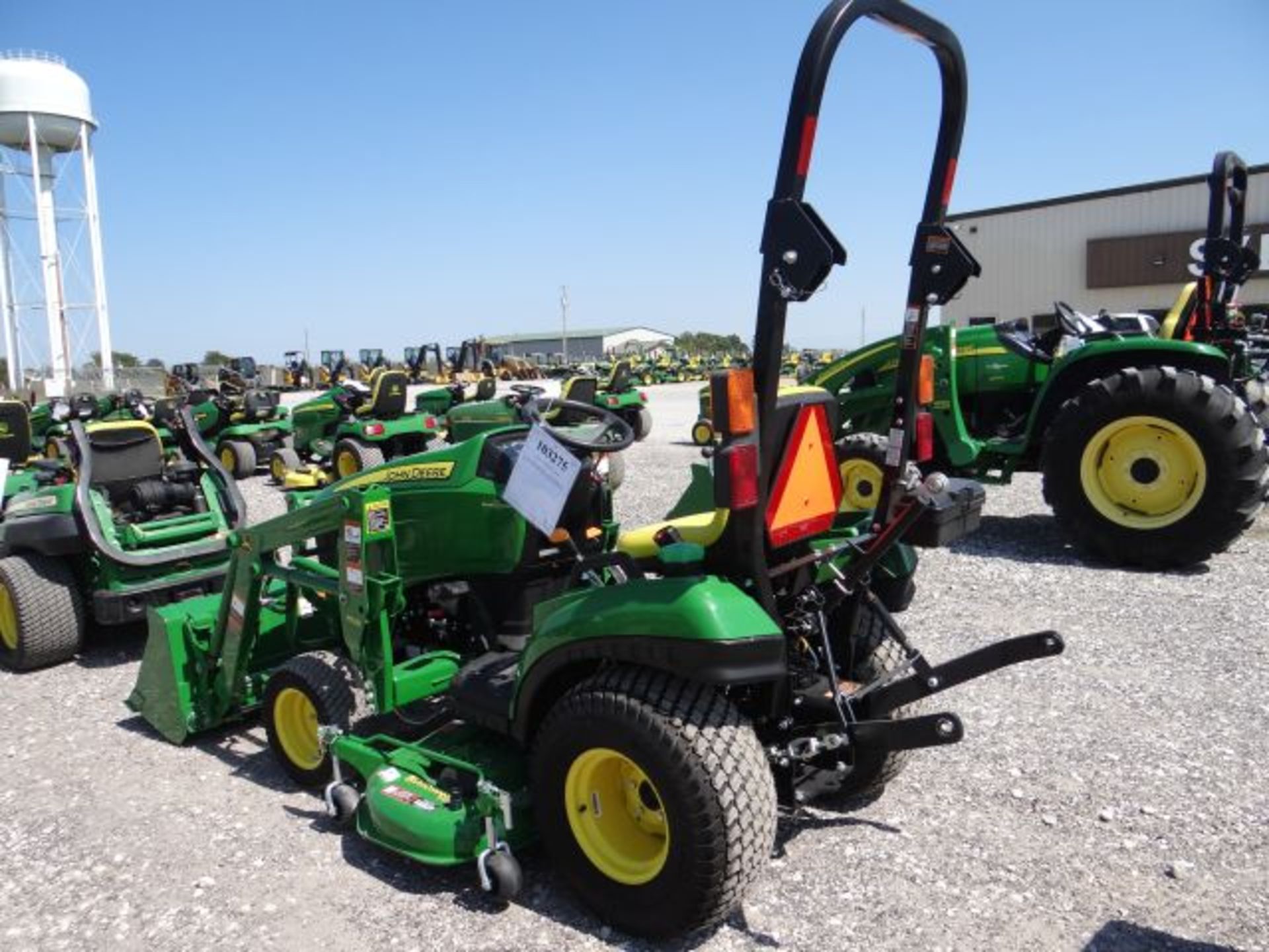 2016 JD 1023E Compact Tractor 5 hrs, 22hp, Yanmar, 2spd, Hydro, MFWD, R-4 Tires, Folding rops, STD