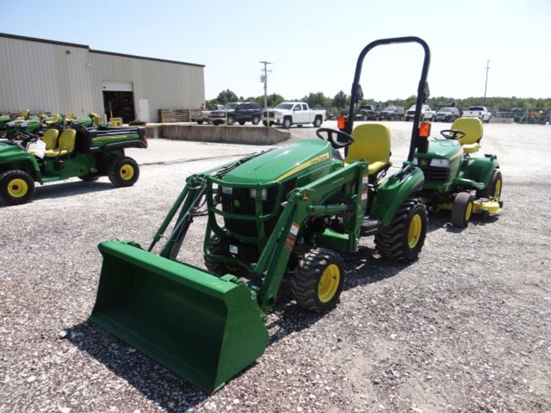 2014 JD 1023E Compact Tractor 48 hrs, 22hp, Yanmar, 2spd, Hydro, MFWD, R-4 Tires, Folding rops,