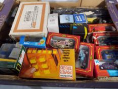 A collection of boxed diecast model motor vehicles to include Corgi,