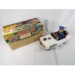 TN Toys, Japan - a tin plate Mystery Police Car, battery powered, automatic steering,