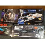 Star Trek - four boxed sets comprising Crew Members Exploration Pack, First Contact Borg wall clock,