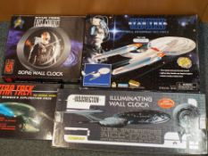 Star Trek - four boxed sets comprising Crew Members Exploration Pack, First Contact Borg wall clock,