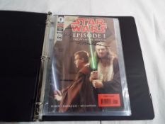 Star Wars - An album containing Star Wars Episode 1, The Phantom Menace comic set 1 - 4,