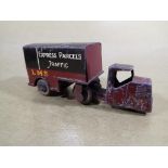 Dinky Toys - a Dinky Toys 33R Railway Mechanical Horse and Trailer 'LMS' with black upper body and