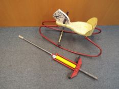 A Pogo stick by Kelo and a steel rocking horse also by Kelo Jetace - (2)